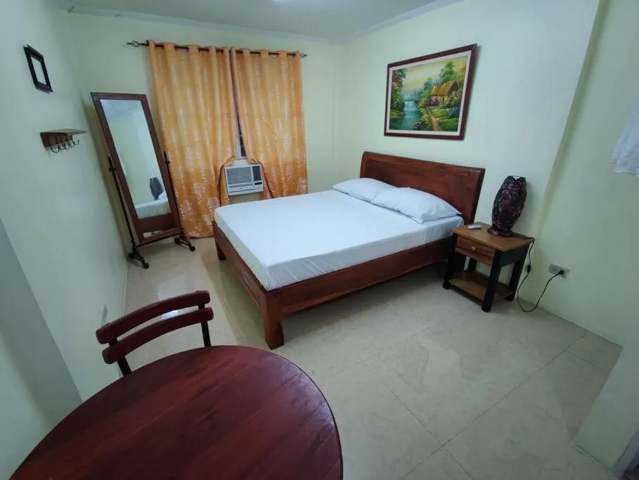 Bed in Lawton Residences Studio Room 2G