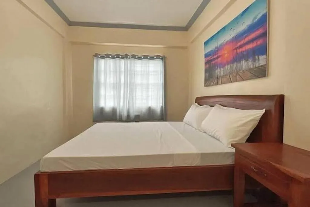 Bed in Lawton Residences Studio Room 2G