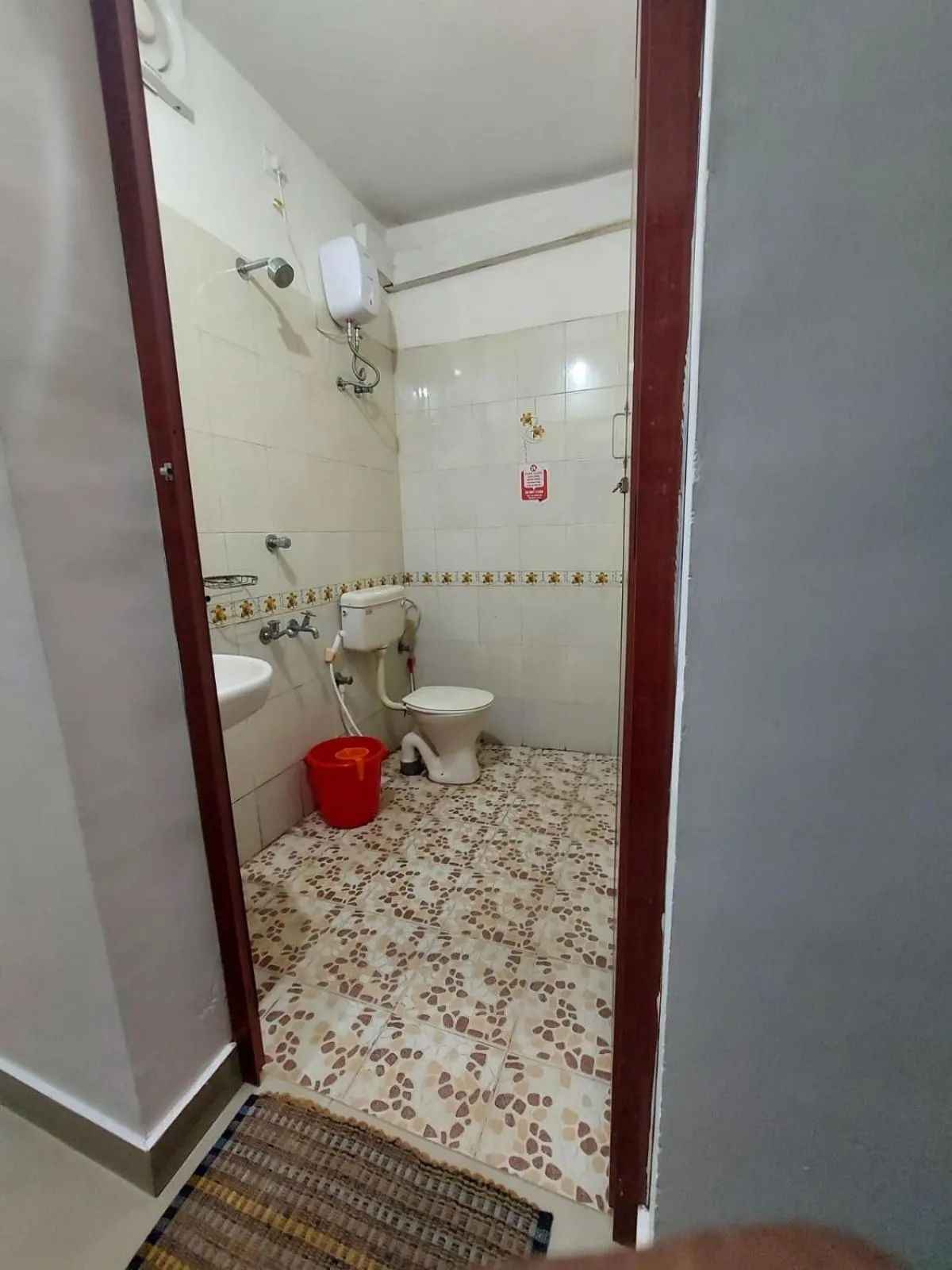 Bathroom in Padmatheertham Inn