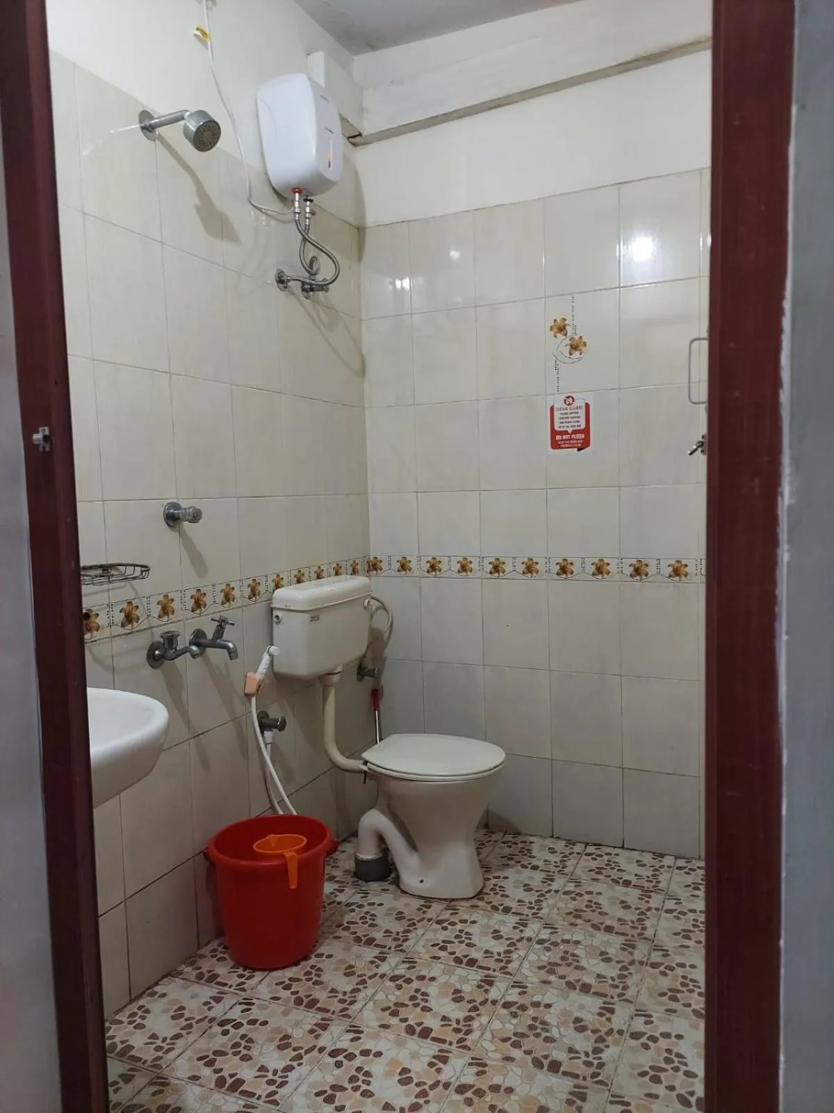 Bathroom in Padmatheertham Inn