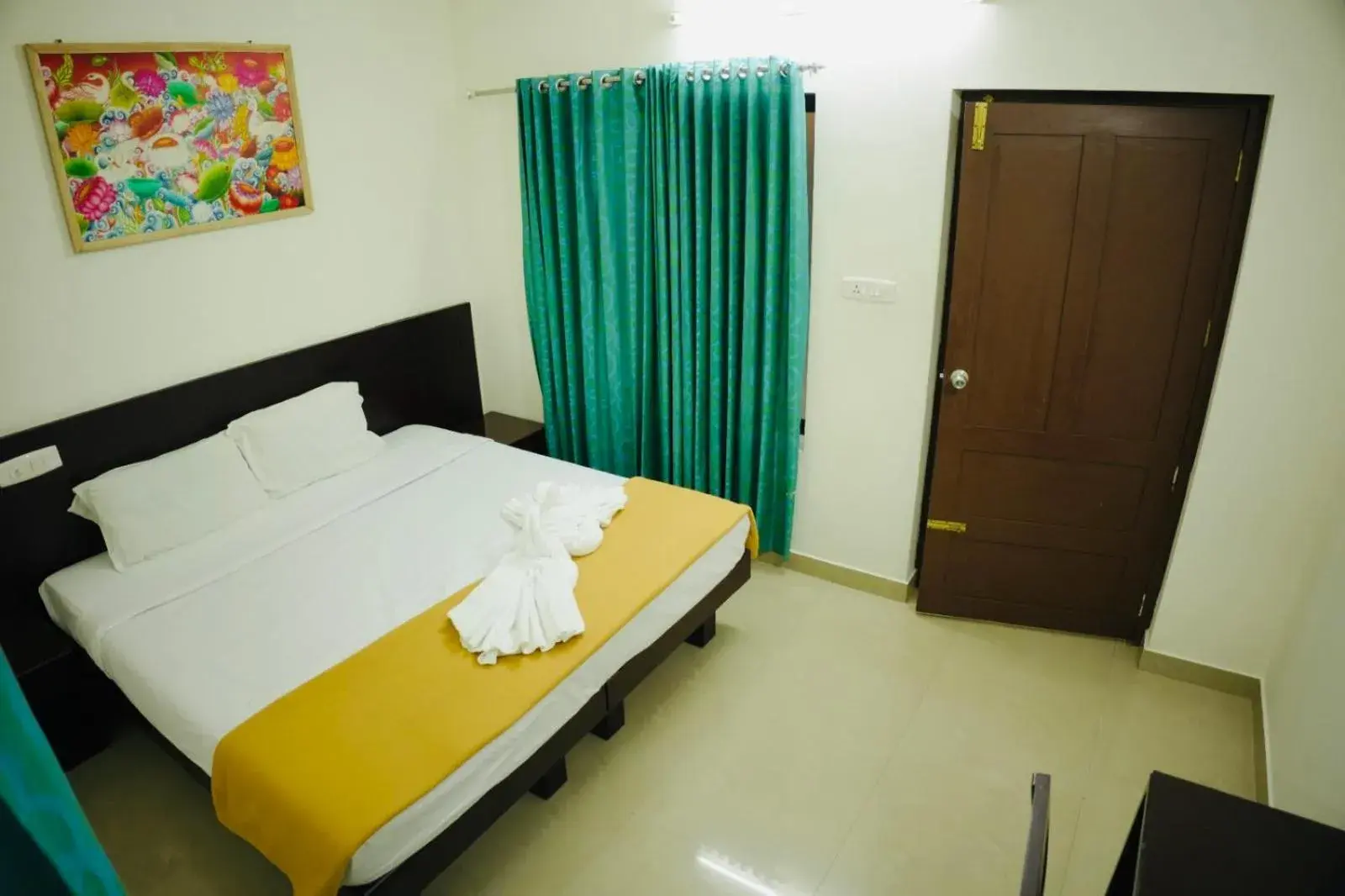 Photo of the whole room, Bed in Padmatheertham Inn Photo of the whole room, Bed in Padmatheertham Inn