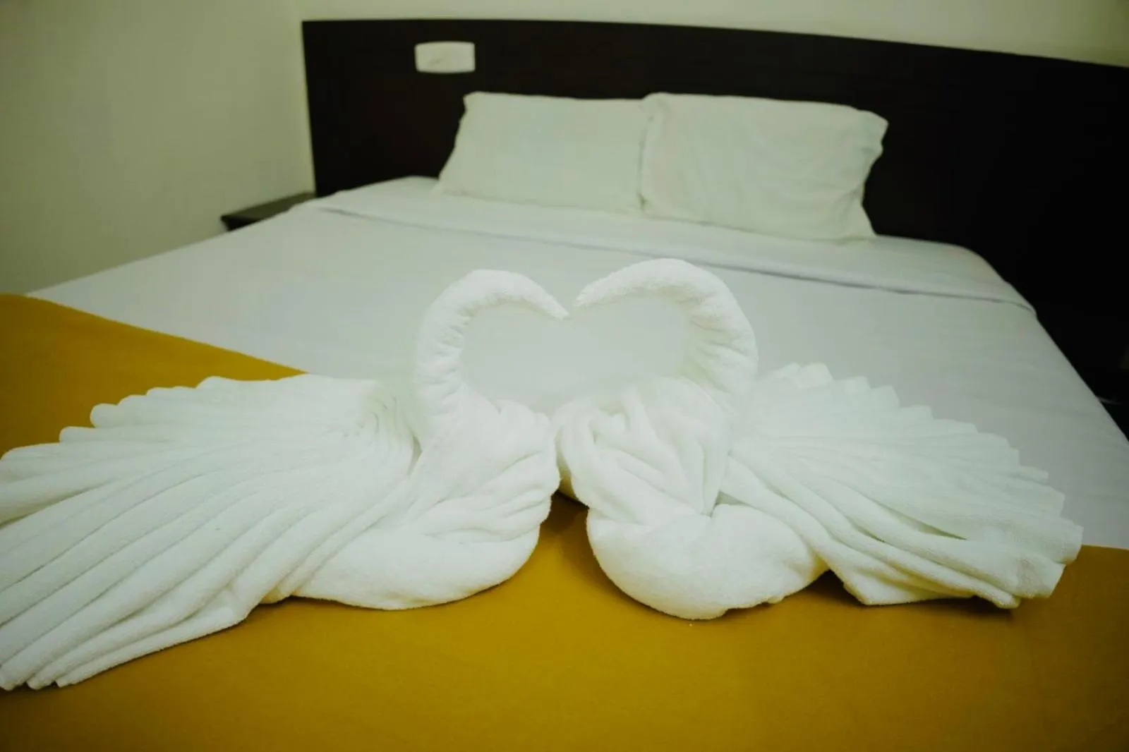 Bed in Padmatheertham Inn