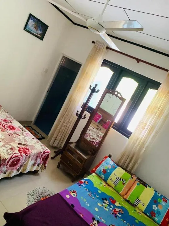 Bed in Indusara Villa Bentota