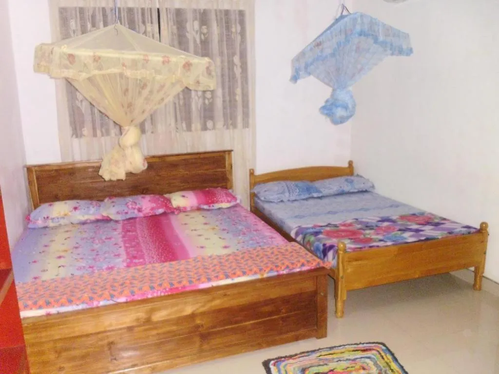 Bed in Indusara Villa Bentota