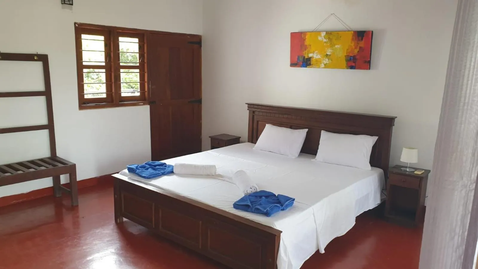 Bed in Bliss Bay Beach Resort & Spa