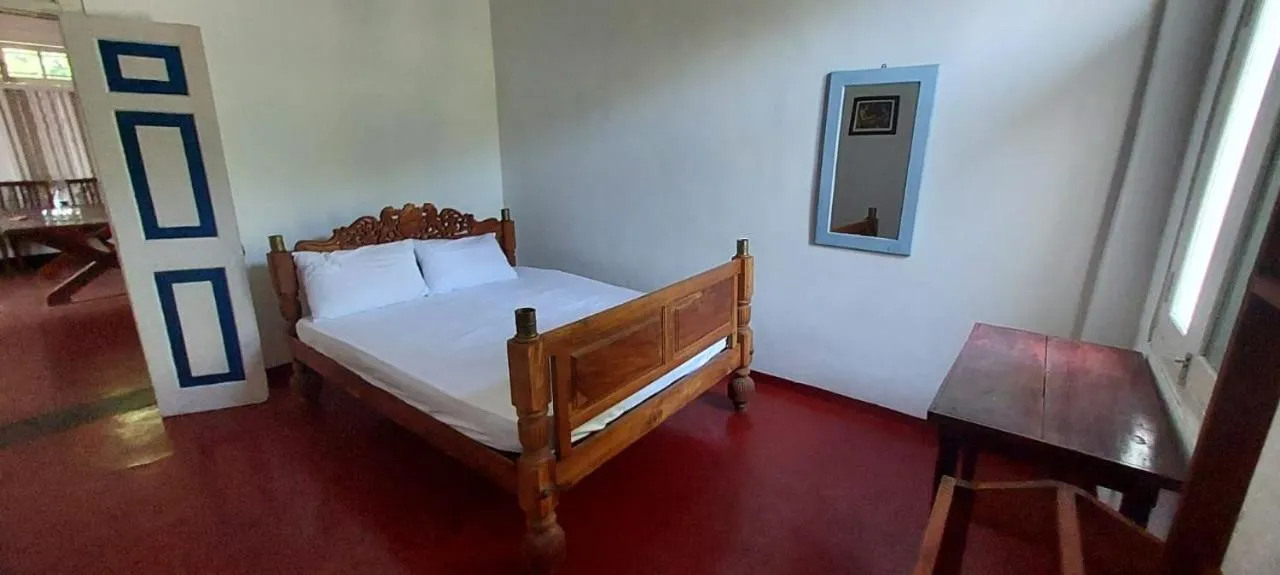 Bed in Bliss Bay Beach Resort & Spa