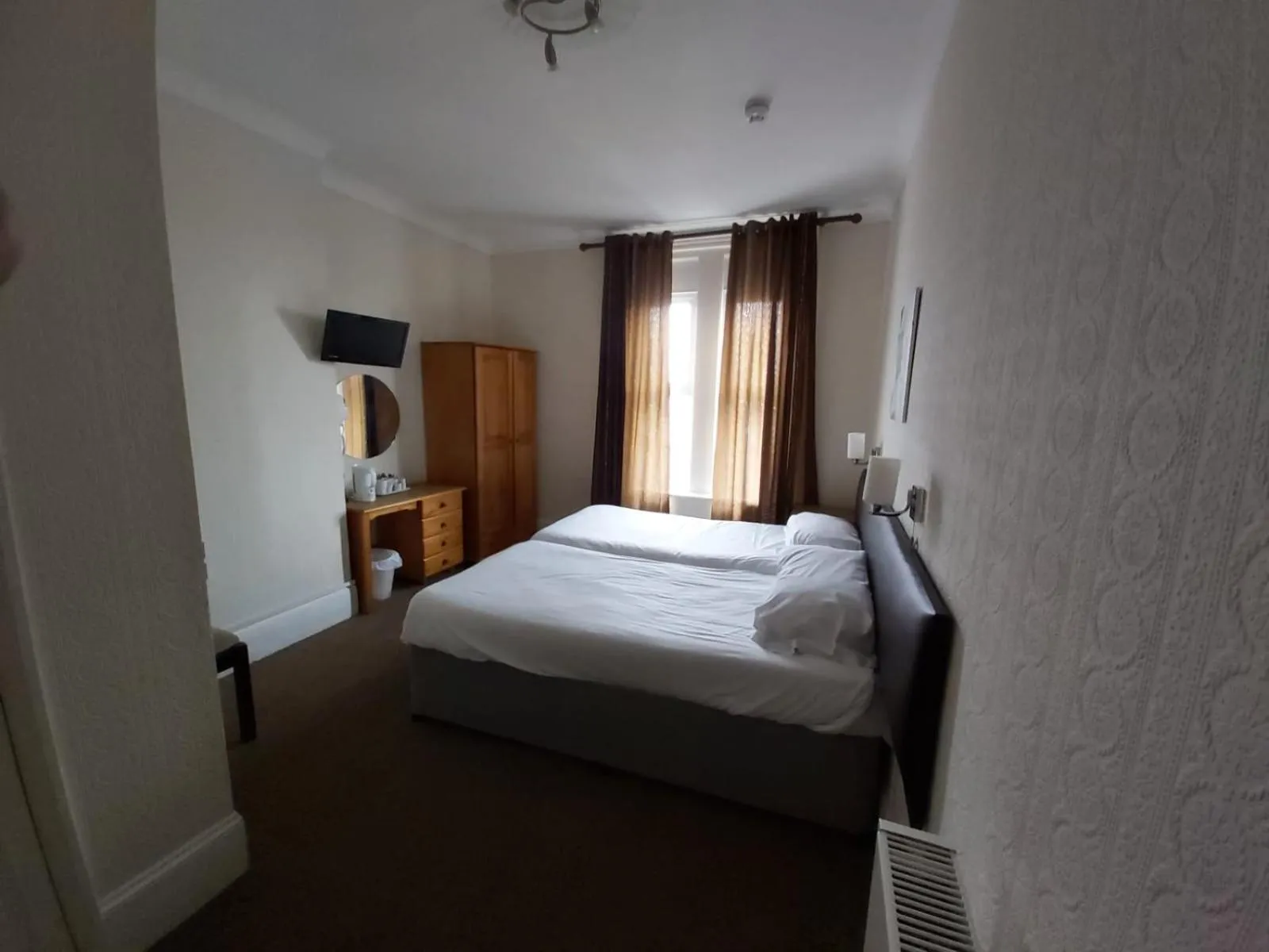 Bedroom in Channel View Hotel