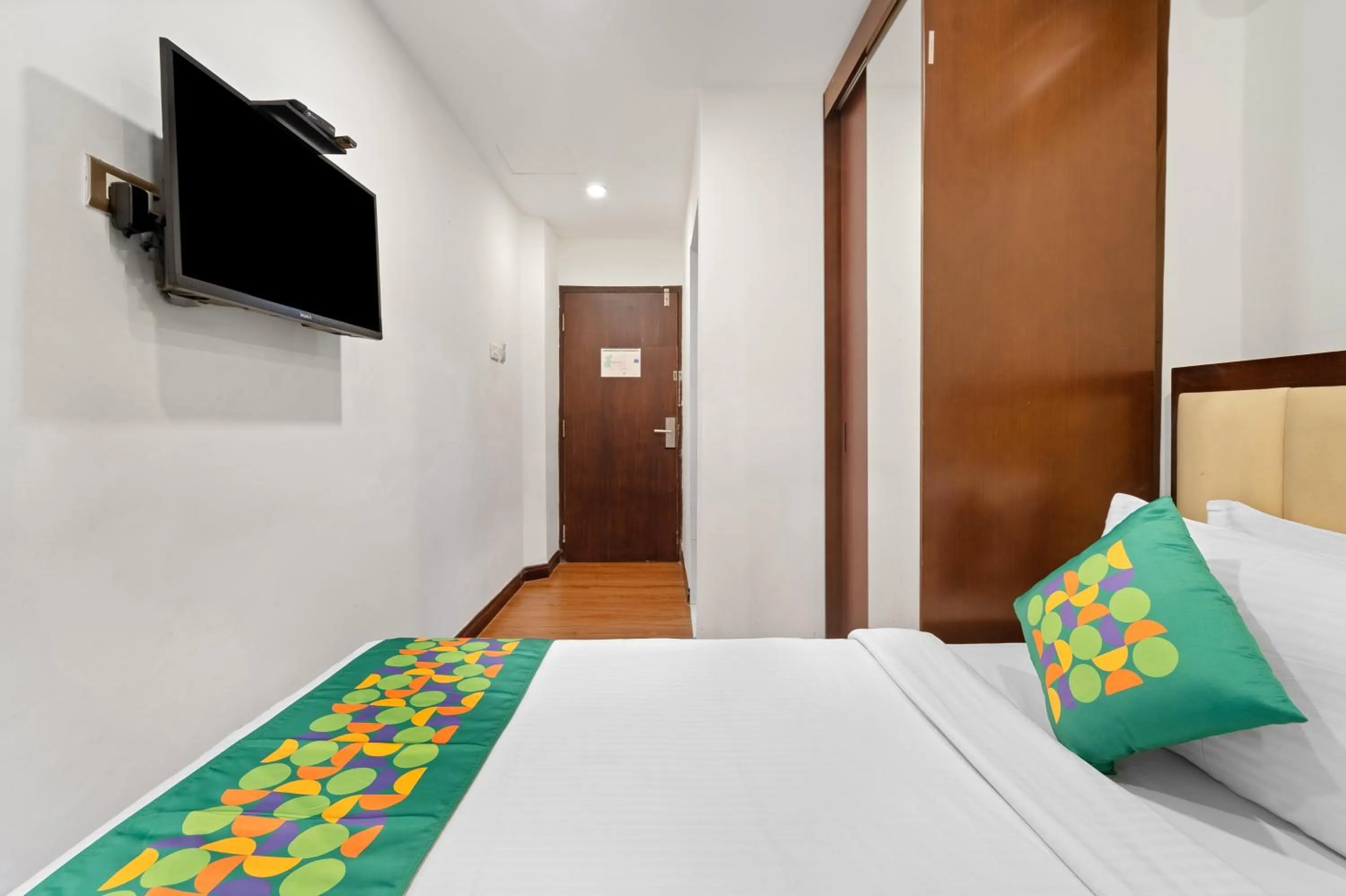 Bedroom, Bed in Treebo Adrak