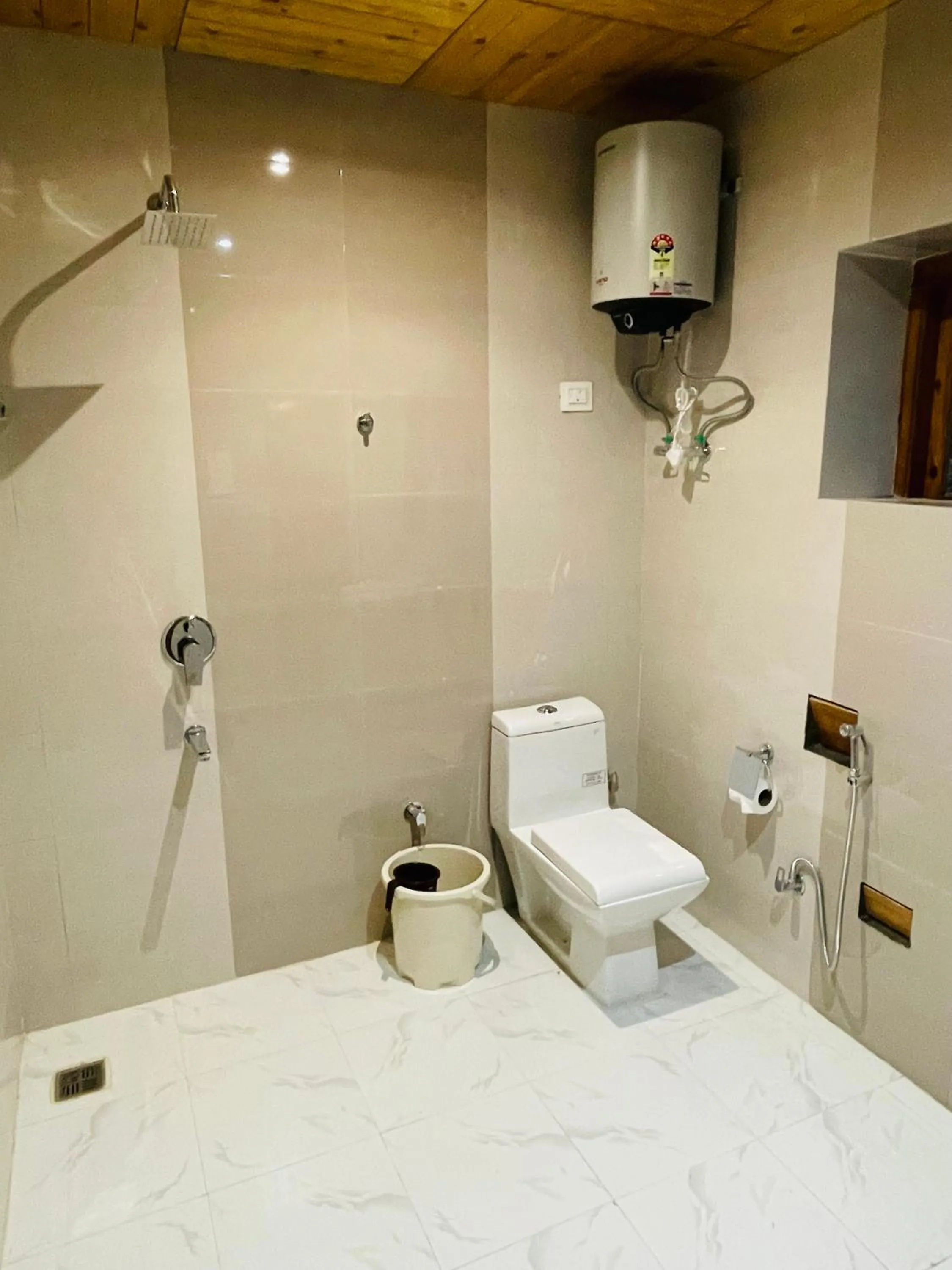 Shower in Thiksay Organic Resort and Retreat