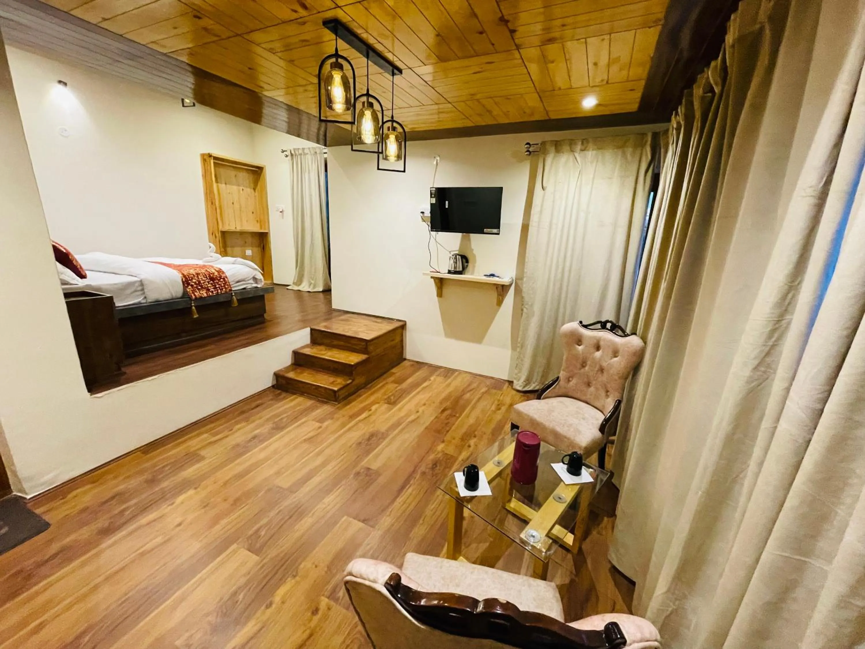 Communal lounge/ TV room, Bed in Thiksay Organic Resort and Retreat