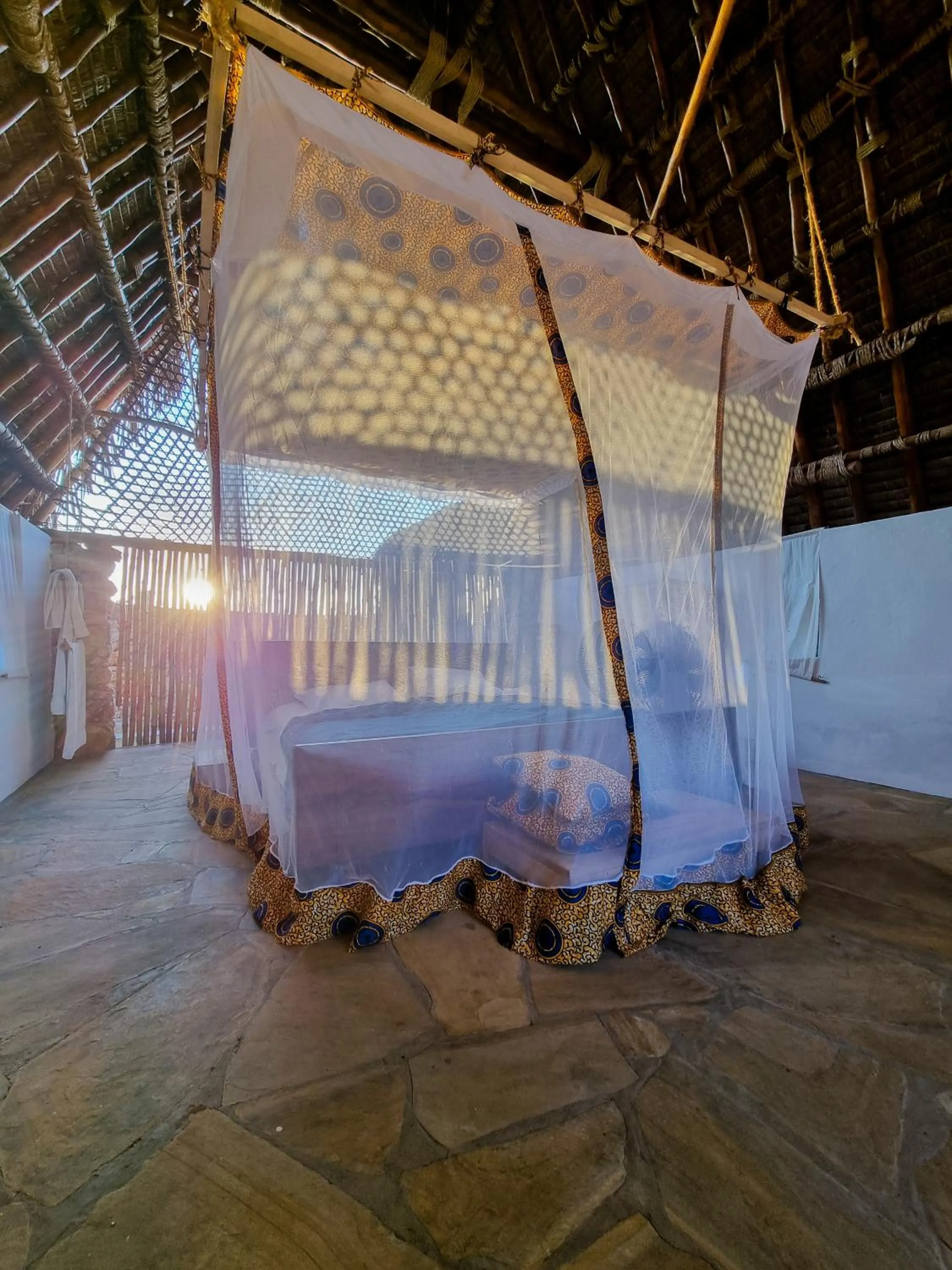 Bed in Pangani Cliffs Lodge