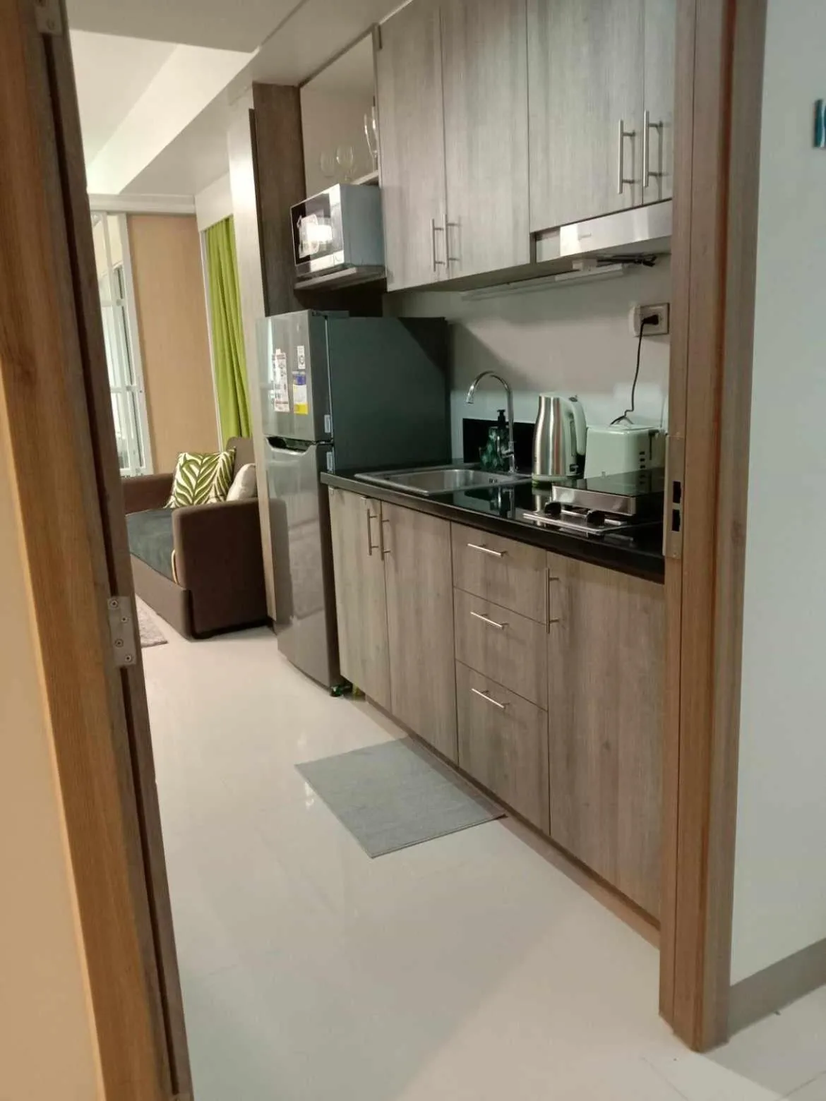 Kitchen or kitchenette in OASIS CHIC By THE BAY PASAY CITY Near Mall of Asia