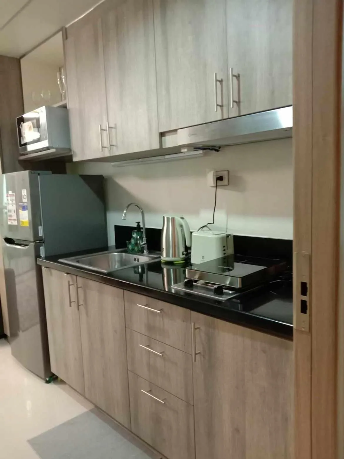 Kitchen or kitchenette in OASIS CHIC By THE BAY PASAY CITY Near Mall of Asia