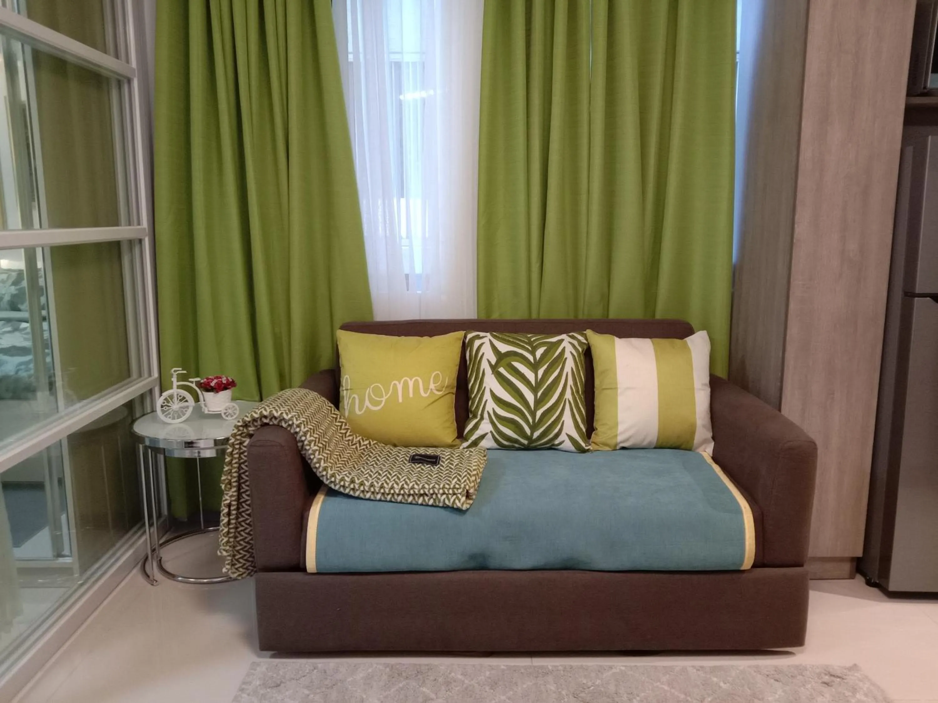 Seating area in OASIS CHIC By THE BAY PASAY CITY Near Mall of Asia