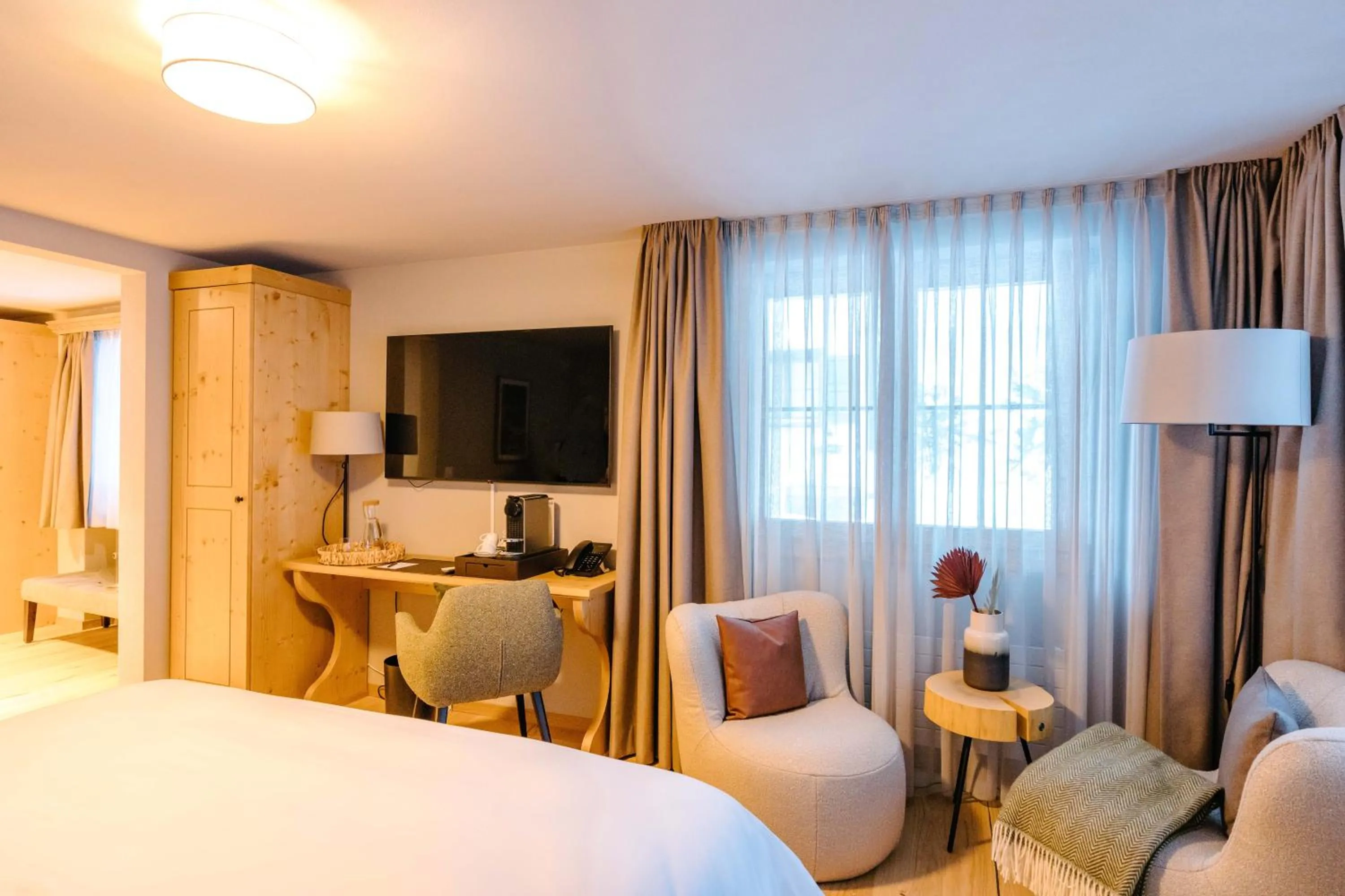 Bed in Seven Alpina Boutique Hotel