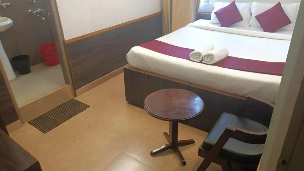 Bed in HOTEL INDIANA Bed in HOTEL INDIANA