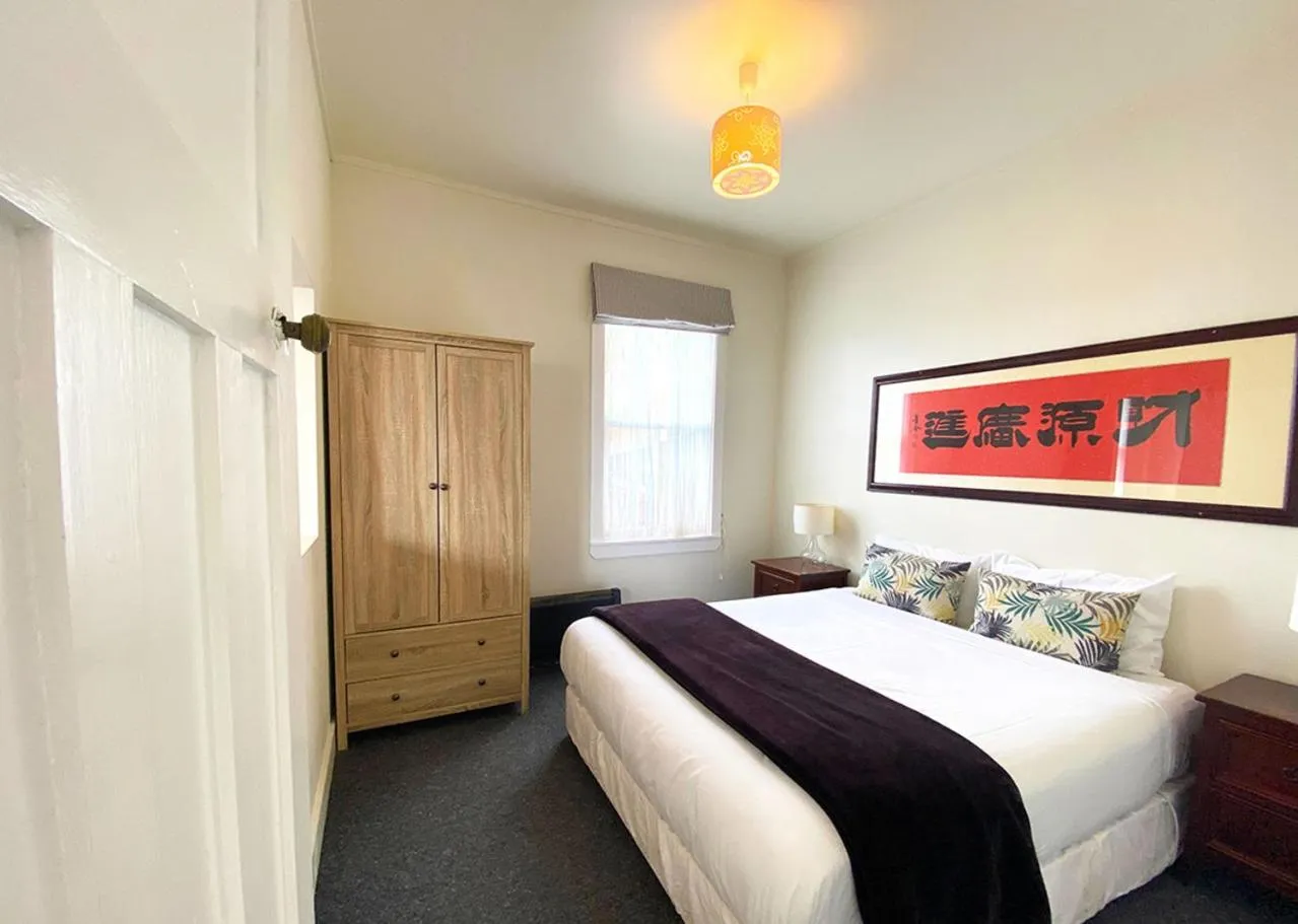 Bed in Mangonui Waterfront Apartments