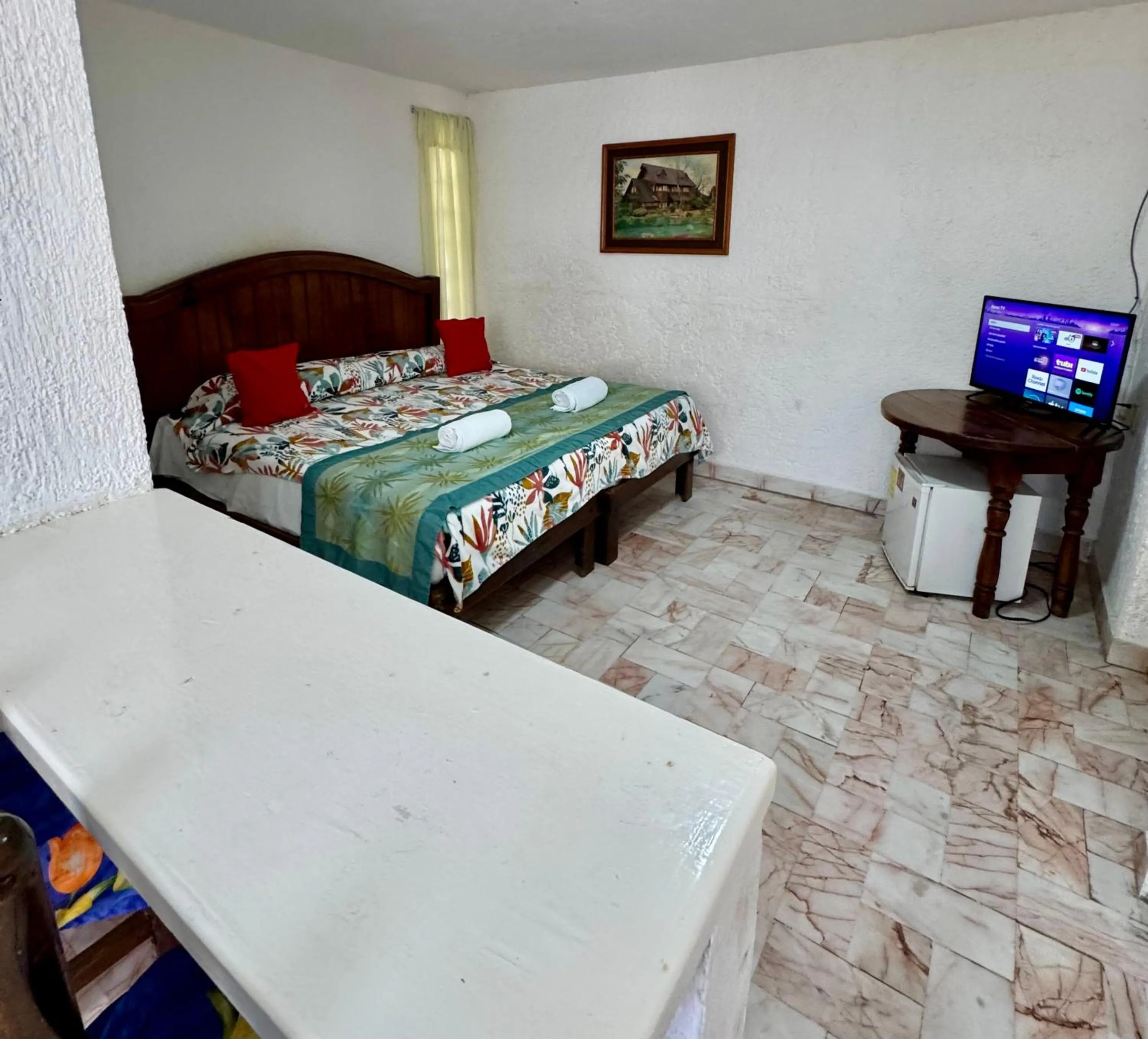 Bed in Hotel Farallon Inn Cancún