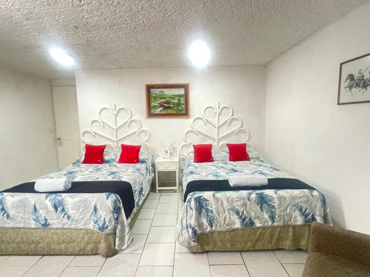 Bed in Hotel Farallon Inn Cancún