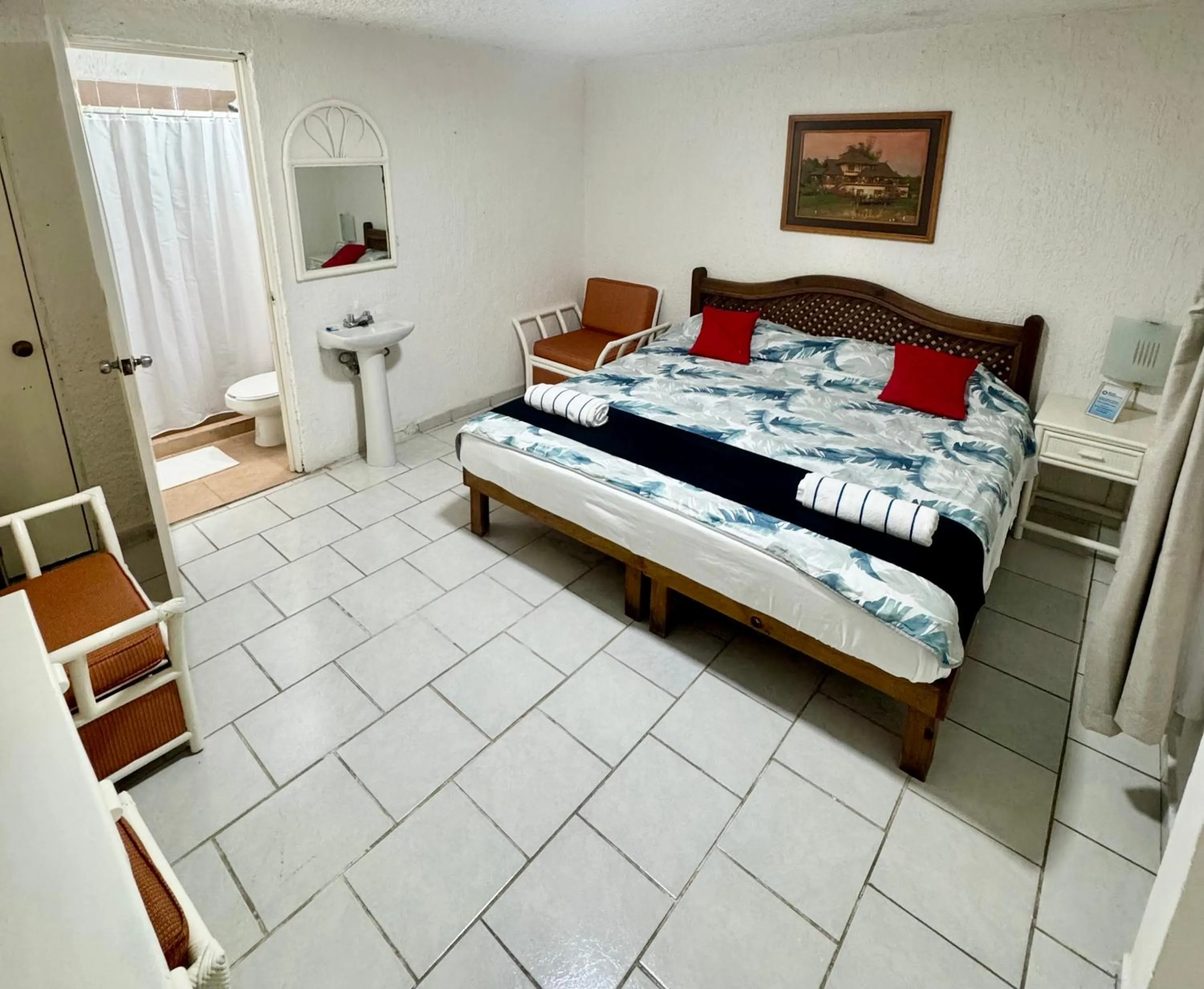 Bed in Hotel Farallon Inn Cancún