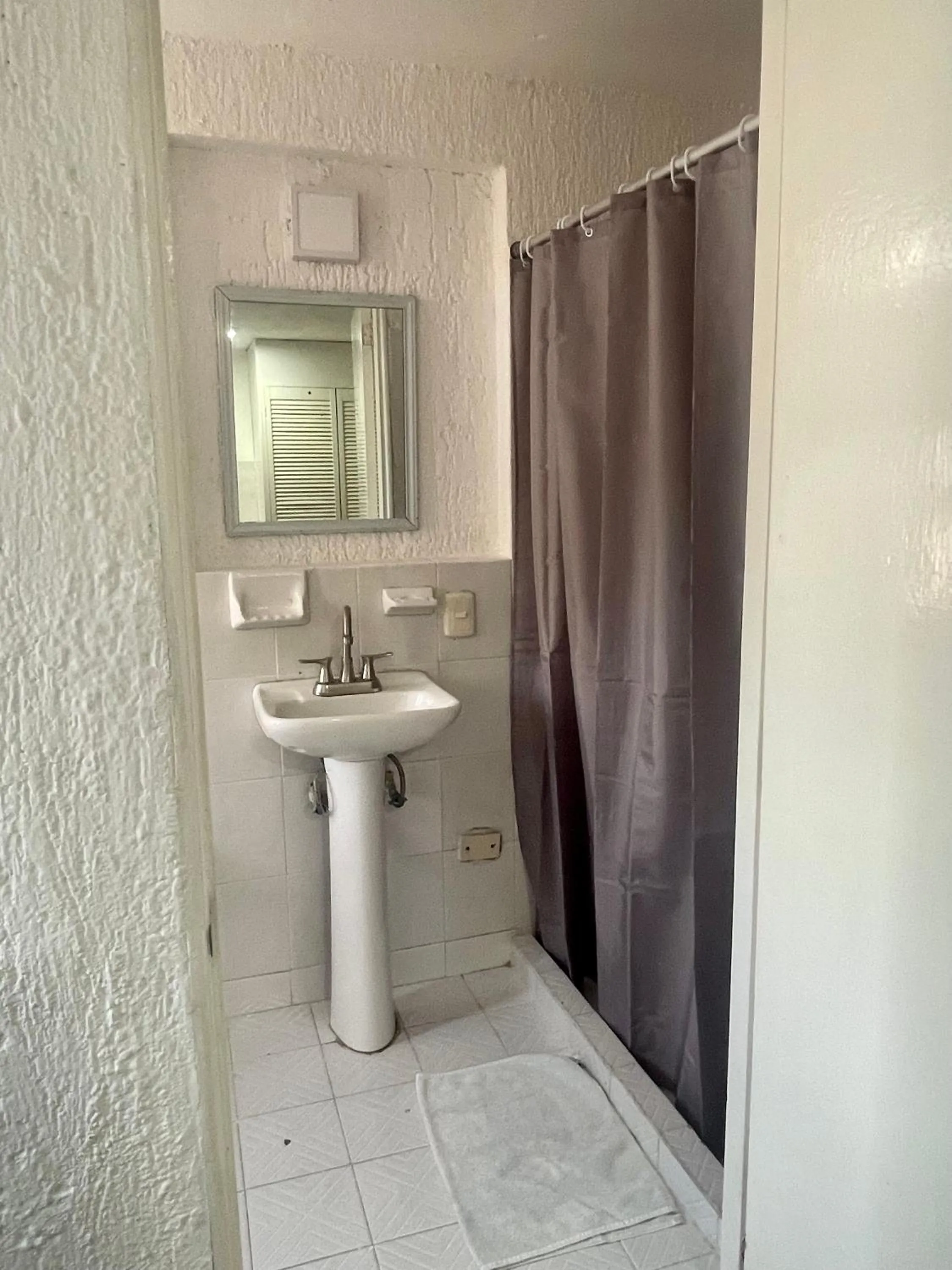 Toilet in Hotel Farallon Inn Cancún