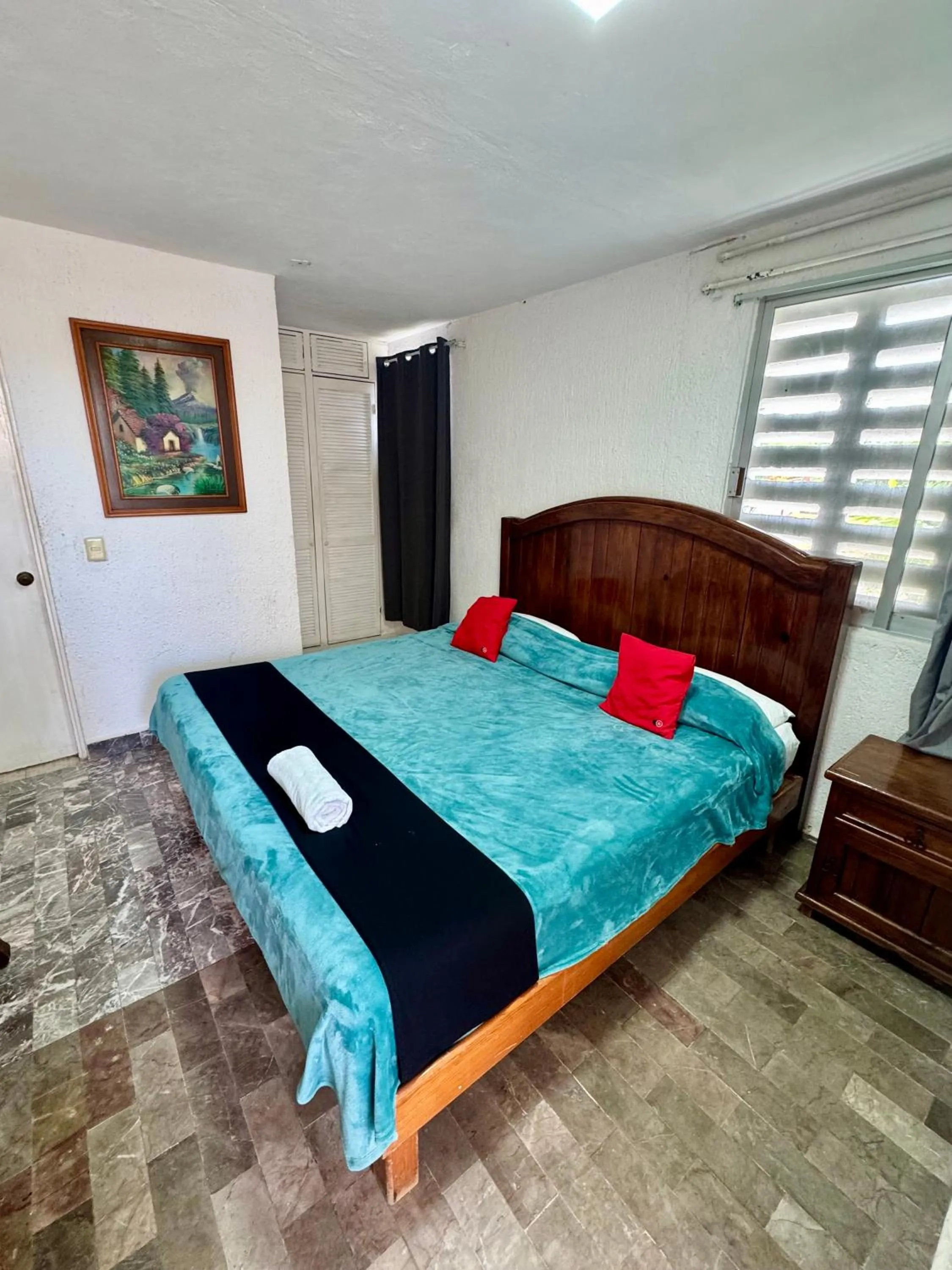 Bed in Hotel Farallon Inn Cancún