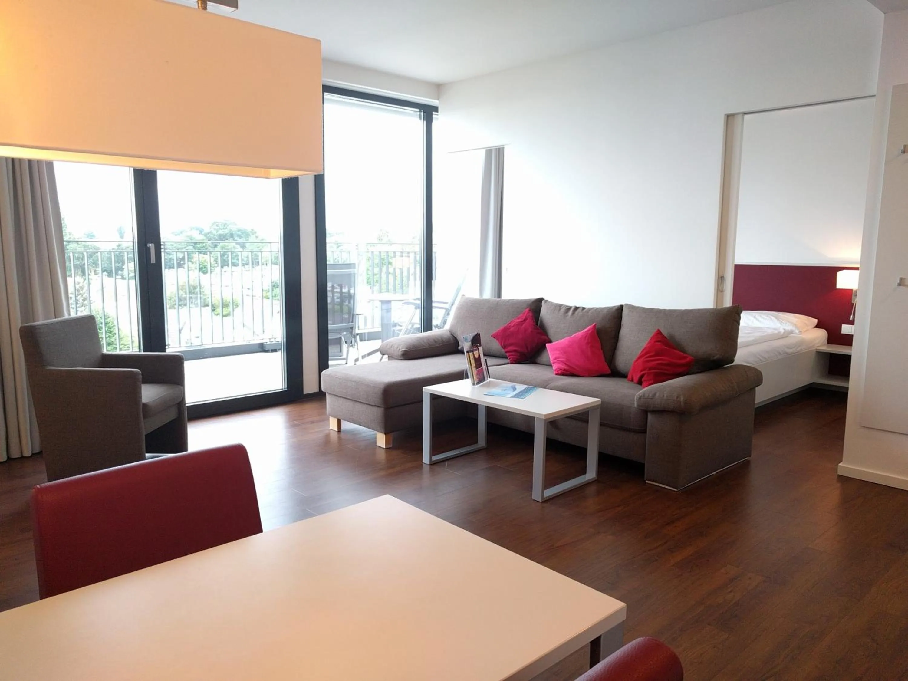 Photo of the whole room in Carat Apartments Grömitz