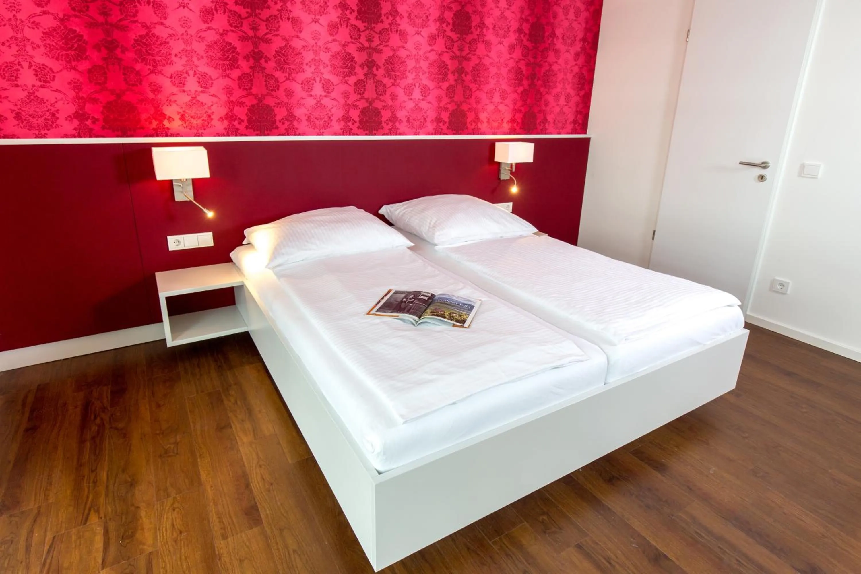 Decorative detail, Bed in Carat Apartments Grömitz