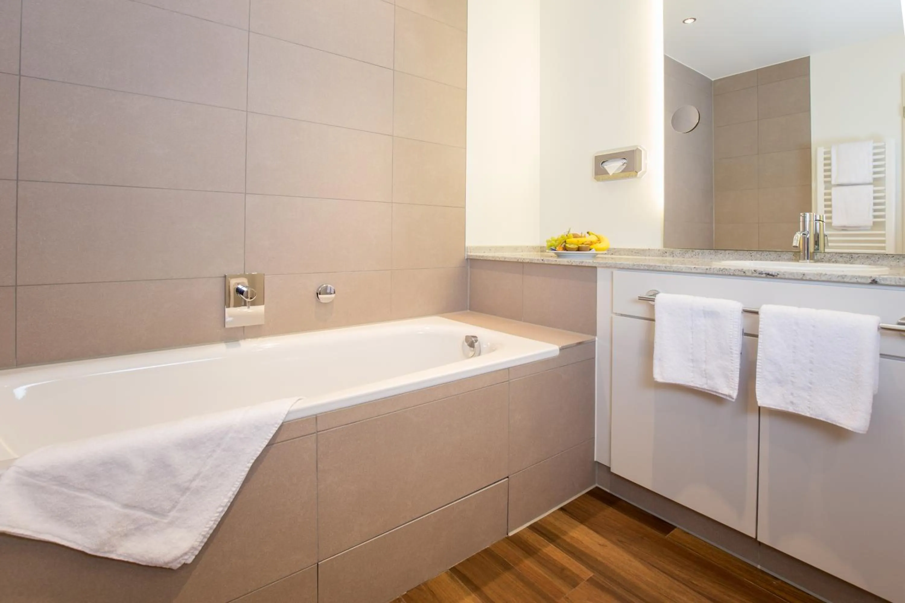 Photo of the whole room in Carat Apartments Grömitz