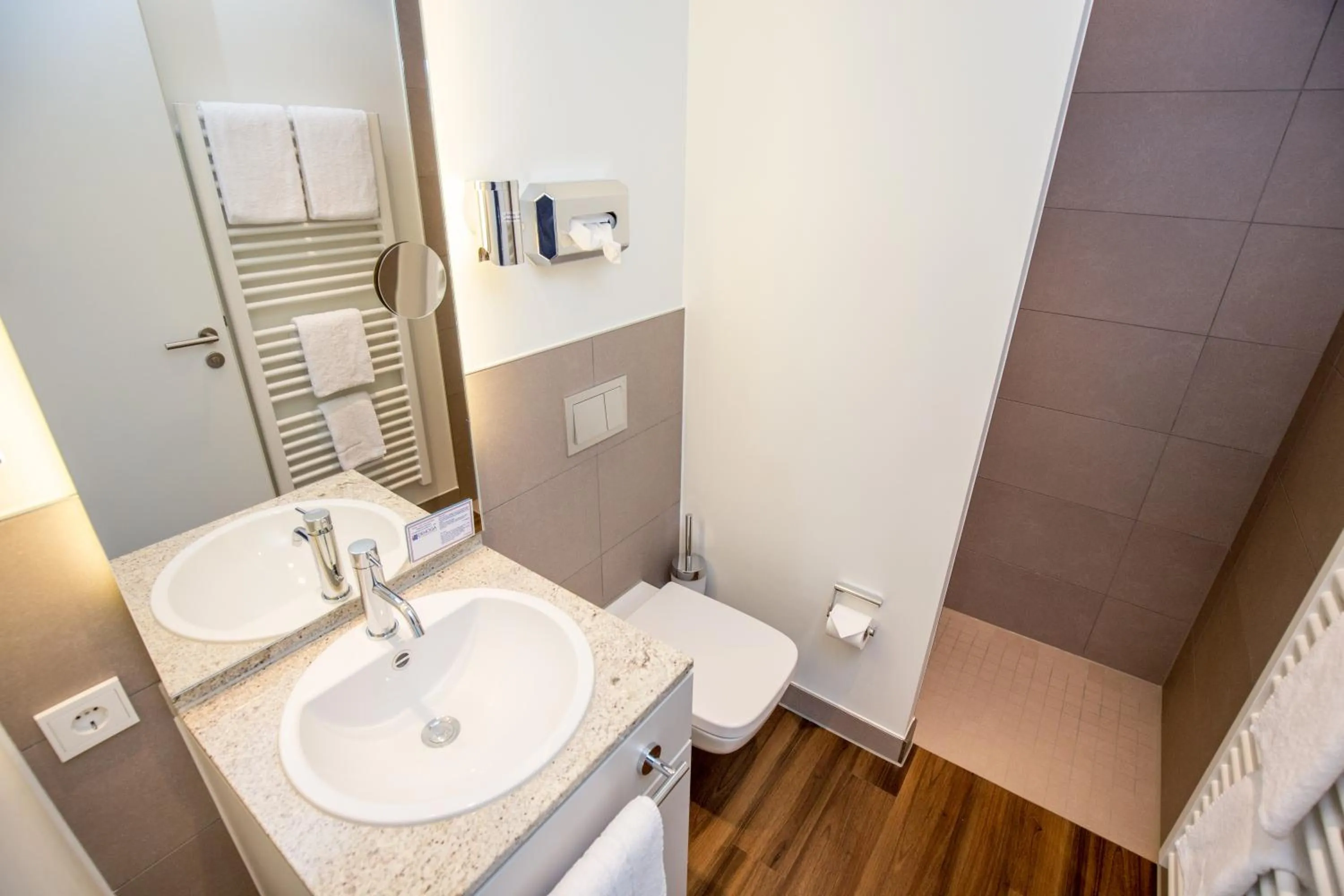 Photo of the whole room in Carat Apartments Grömitz