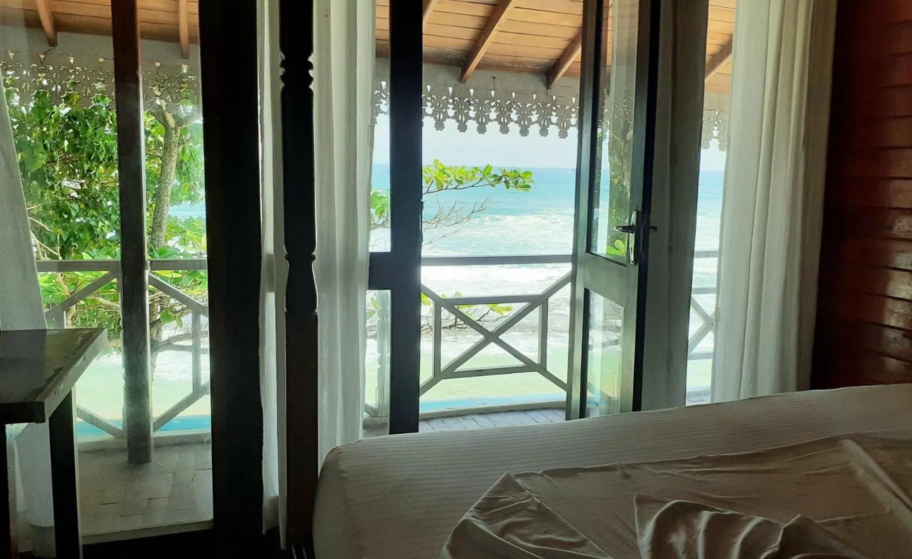 Bed in Coral Beach Hotel