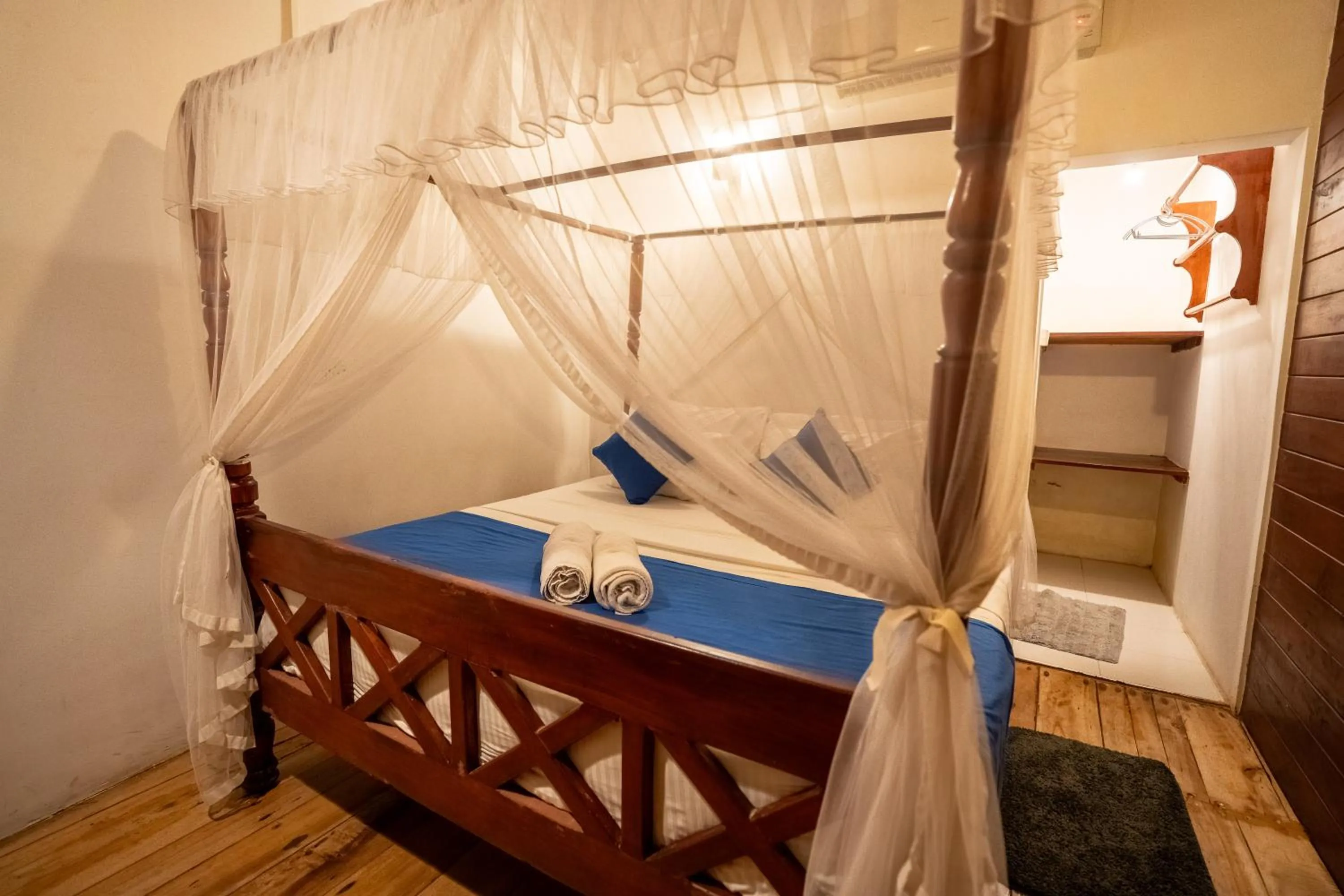 Bed in Coral Beach Hotel