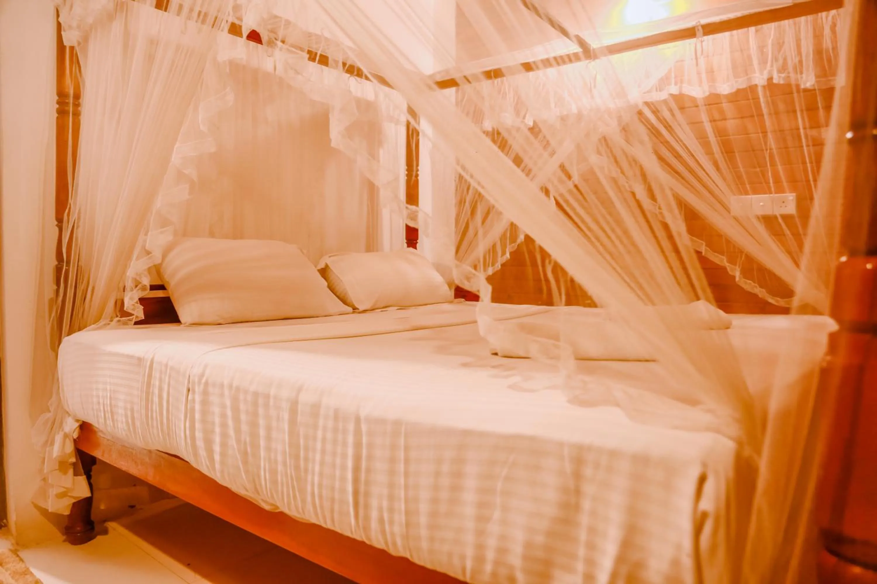 Bed in Coral Beach Hotel