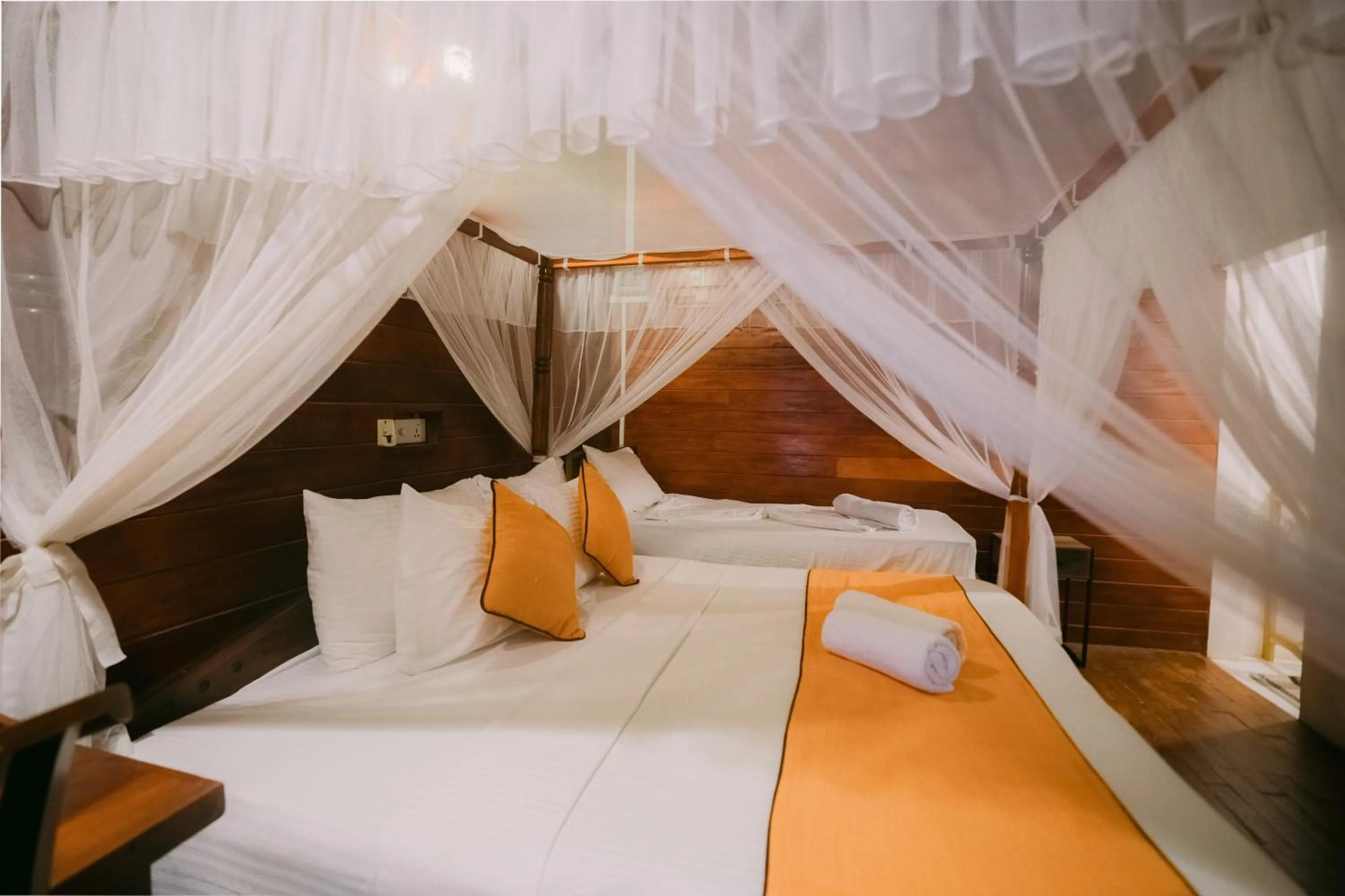 Bed in Coral Beach Hotel