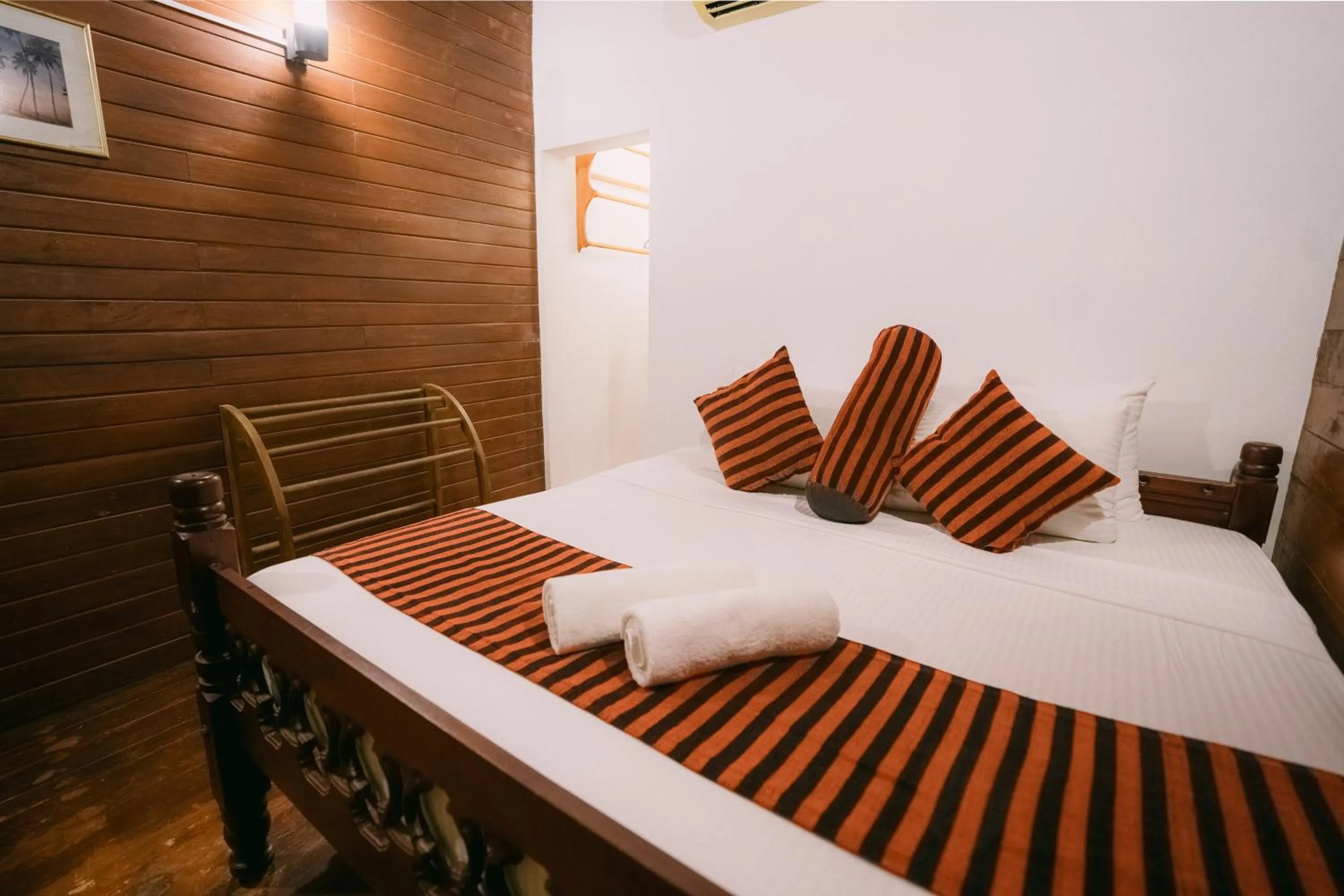 Bed in Coral Beach Hotel