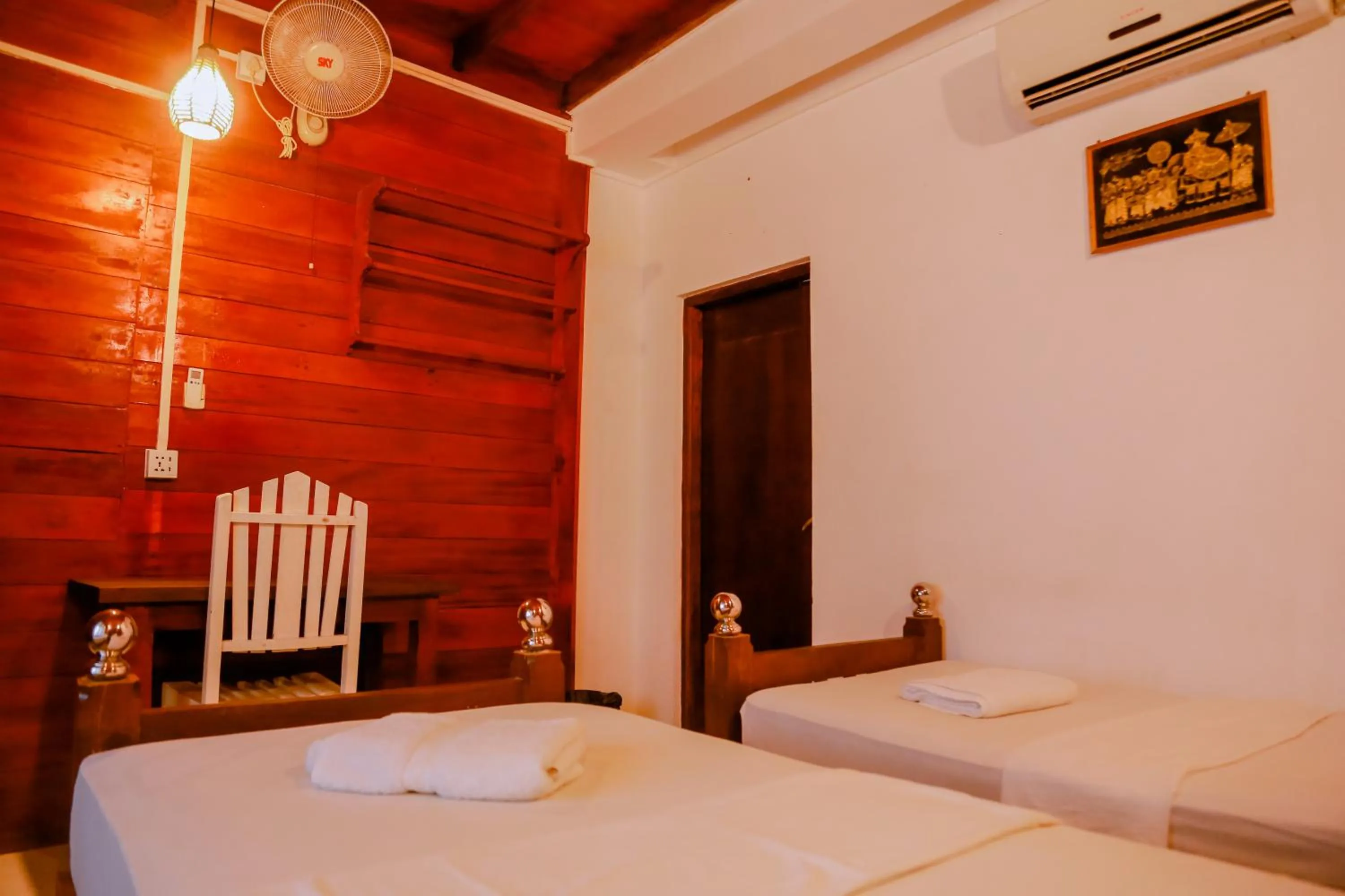 Bed in Coral Beach Hotel