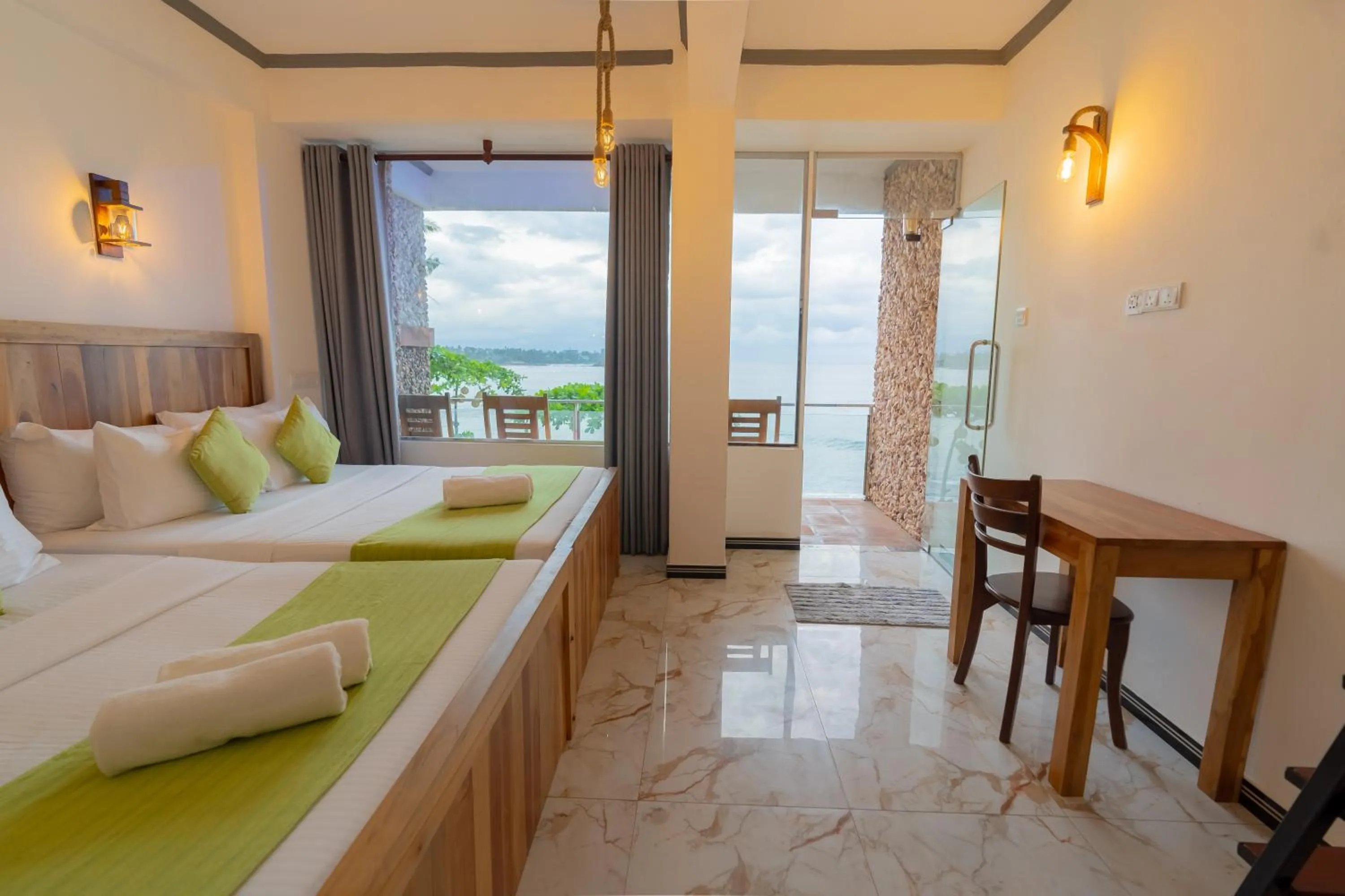 Bed in Coral Beach Hotel