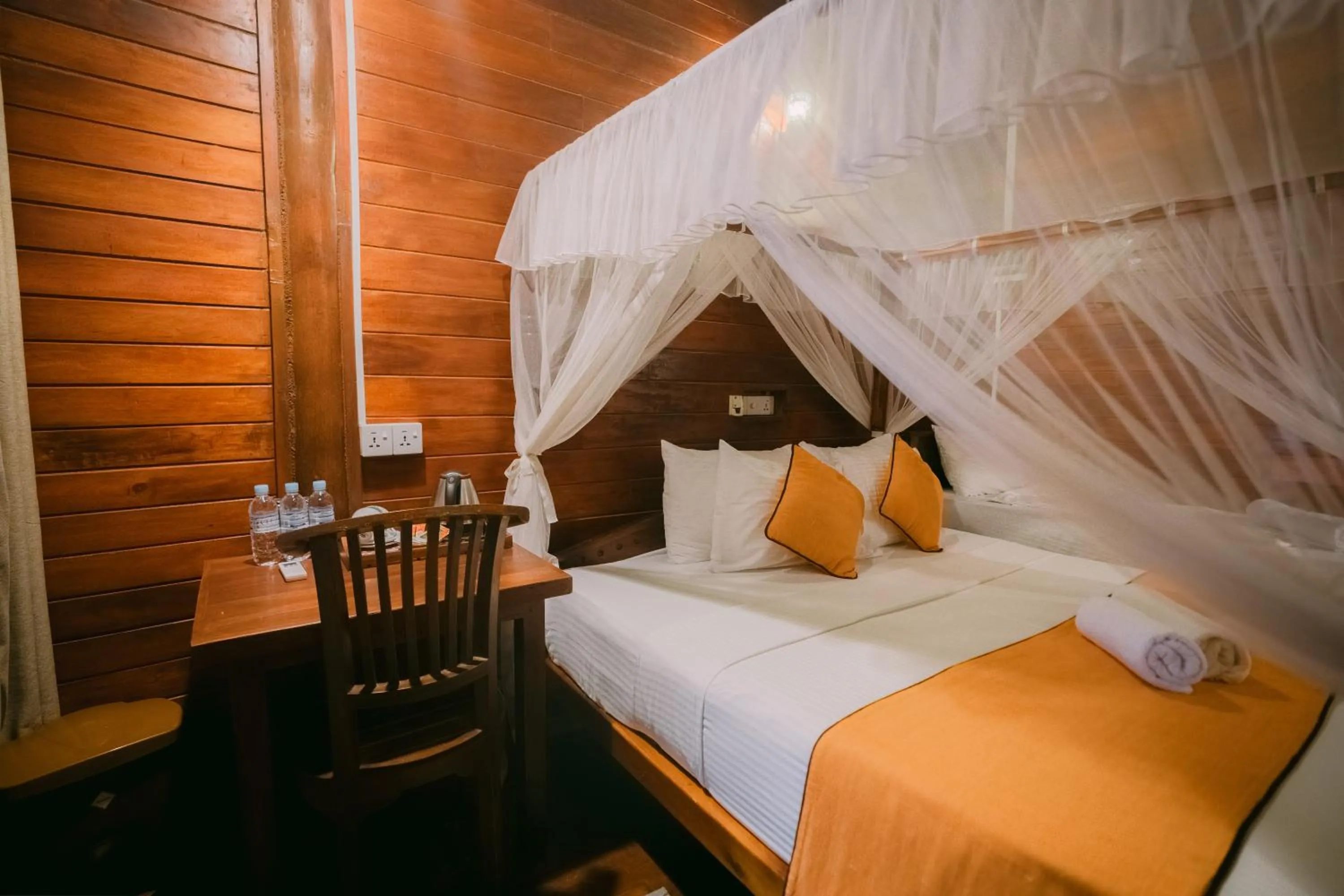 Bed in Coral Beach Hotel