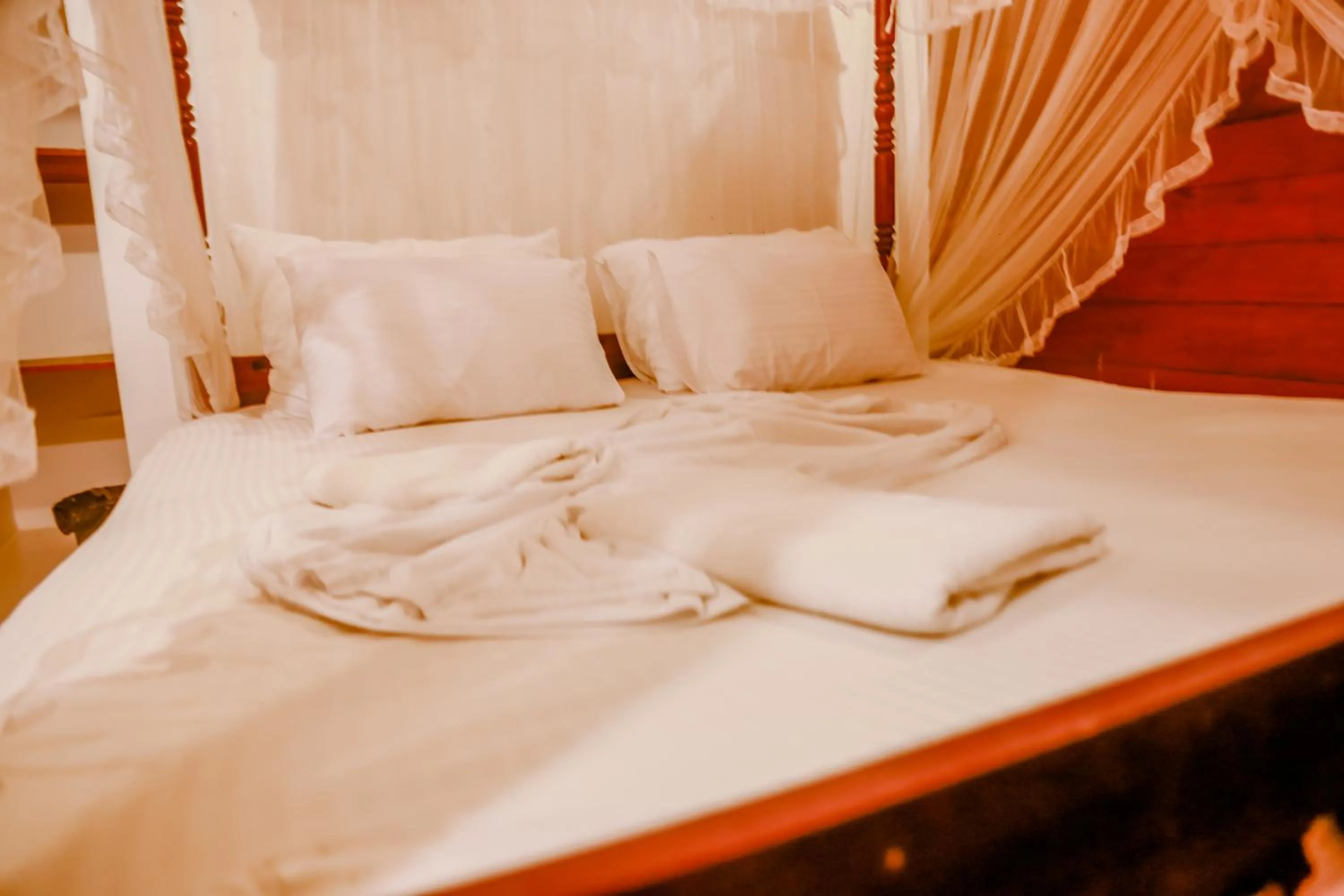 Bed in Coral Beach Hotel