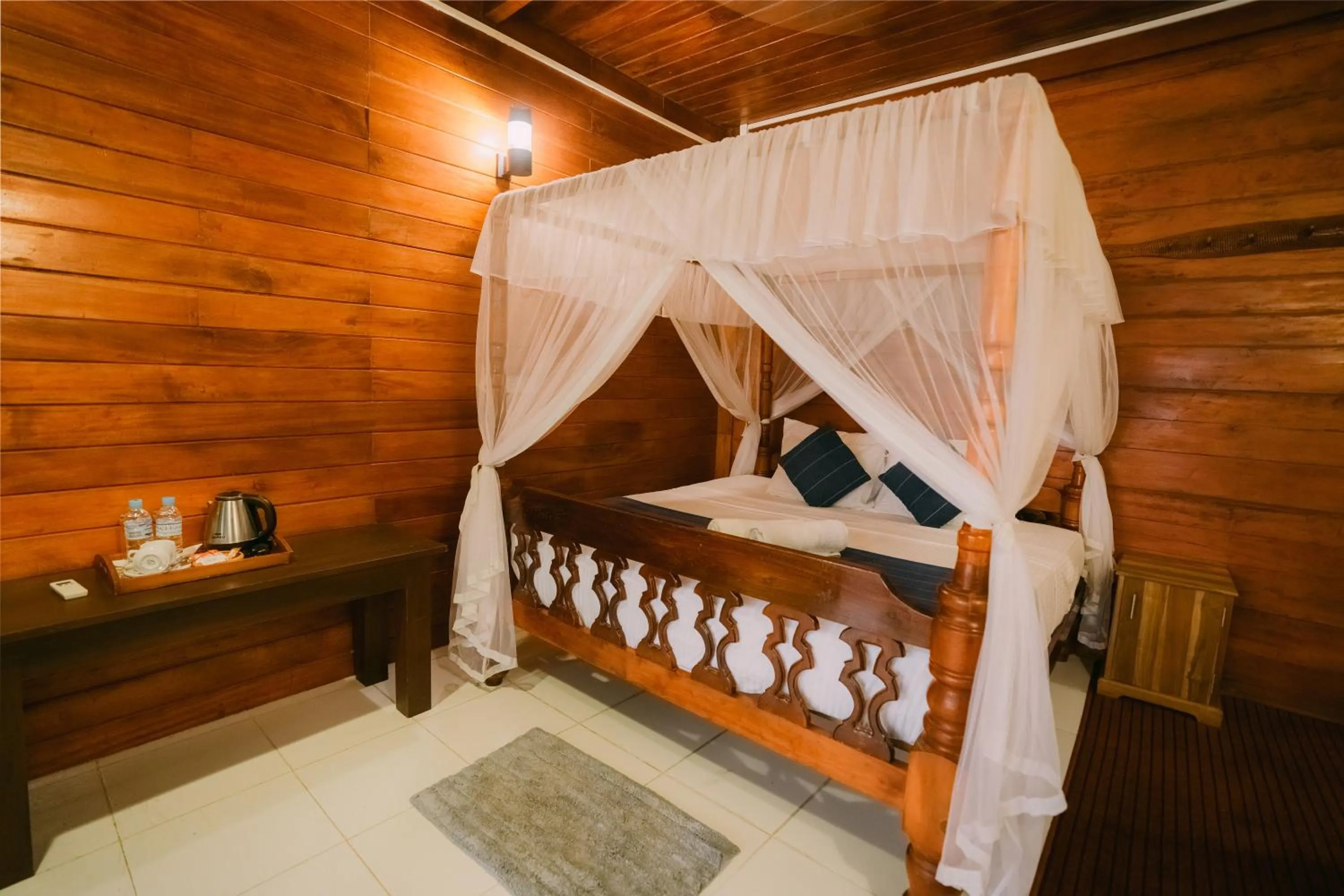 Bed in Coral Beach Hotel