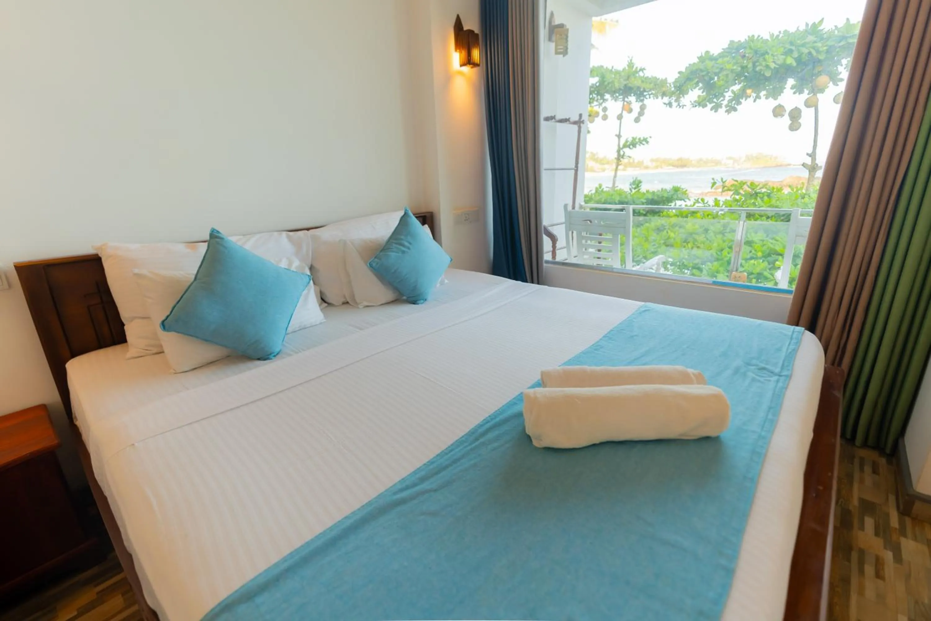 Bed in Coral Beach Hotel