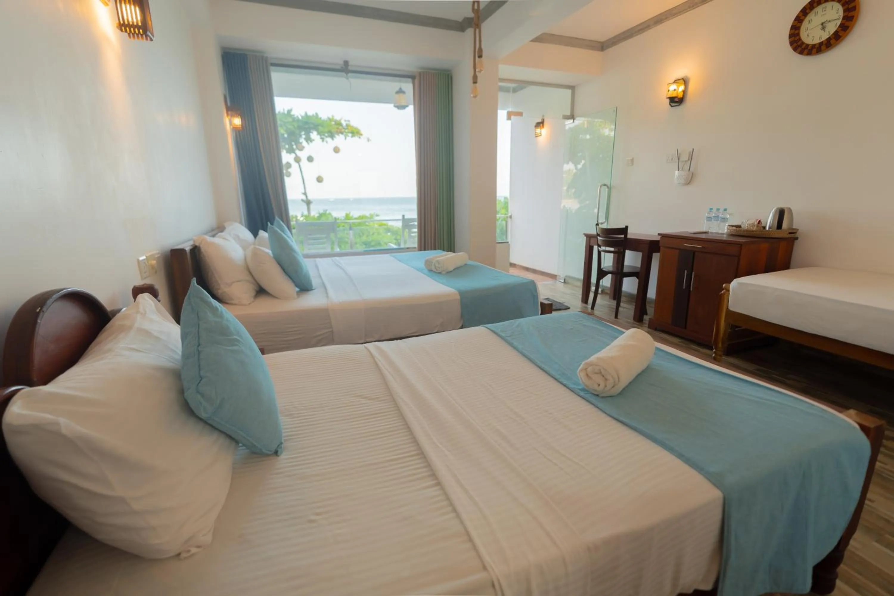Bed in Coral Beach Hotel