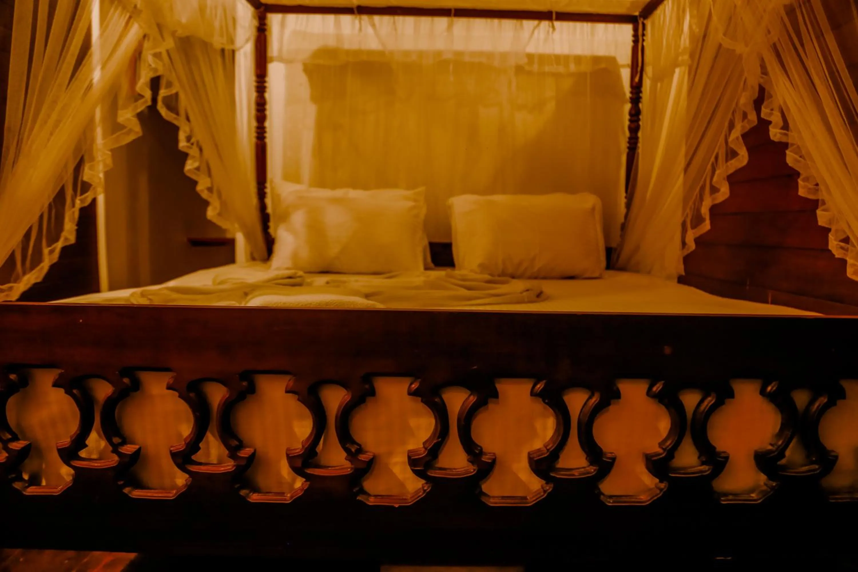 Bed in Coral Beach Hotel