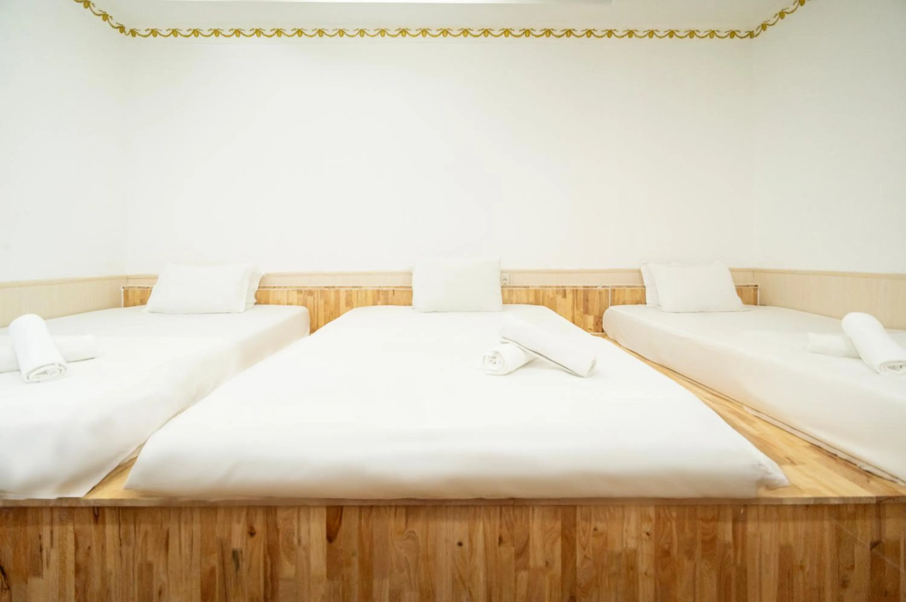 Bed in CROWNE BUI VIEN Hotel