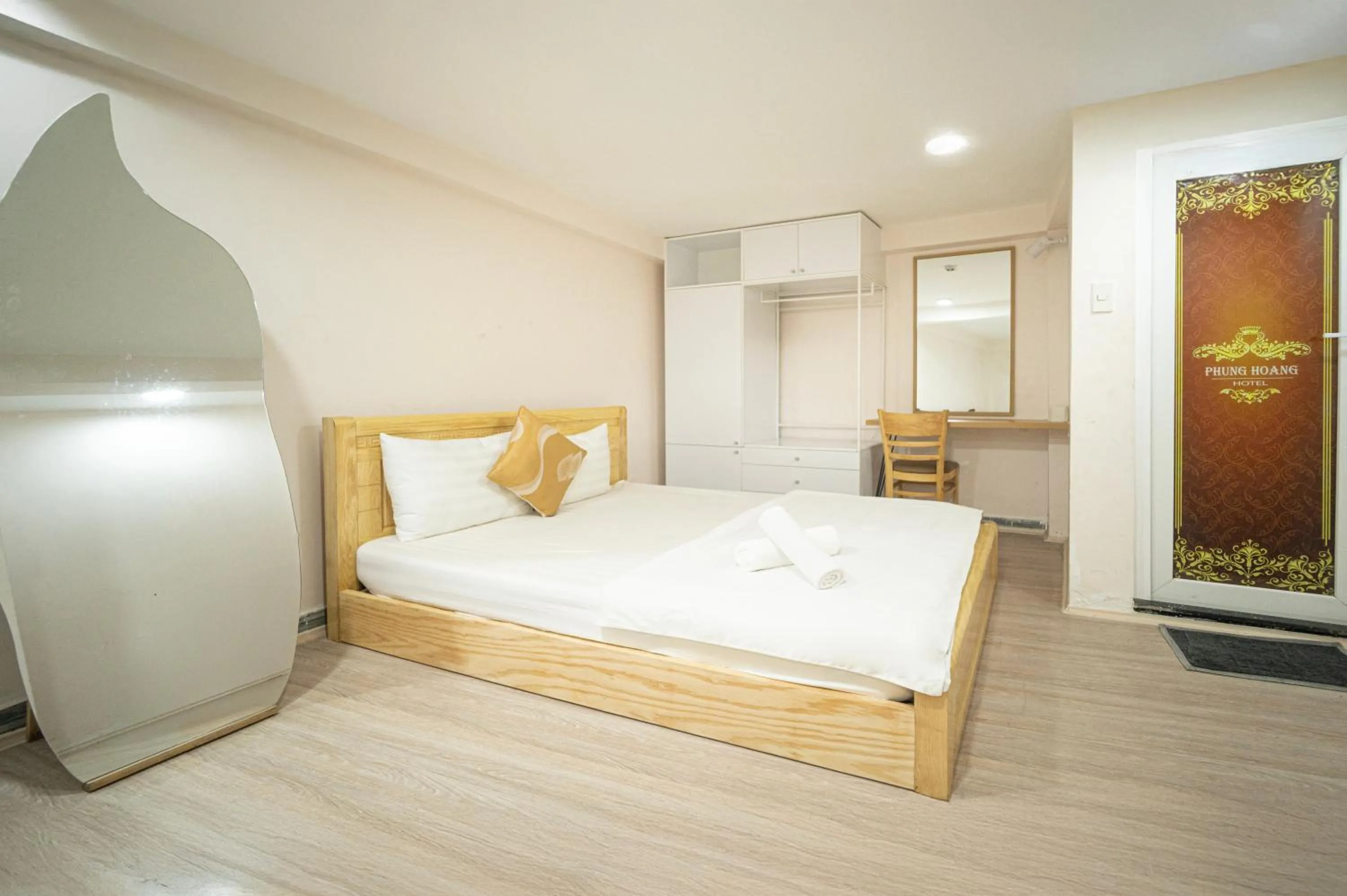 Bed in CROWNE BUI VIEN Hotel