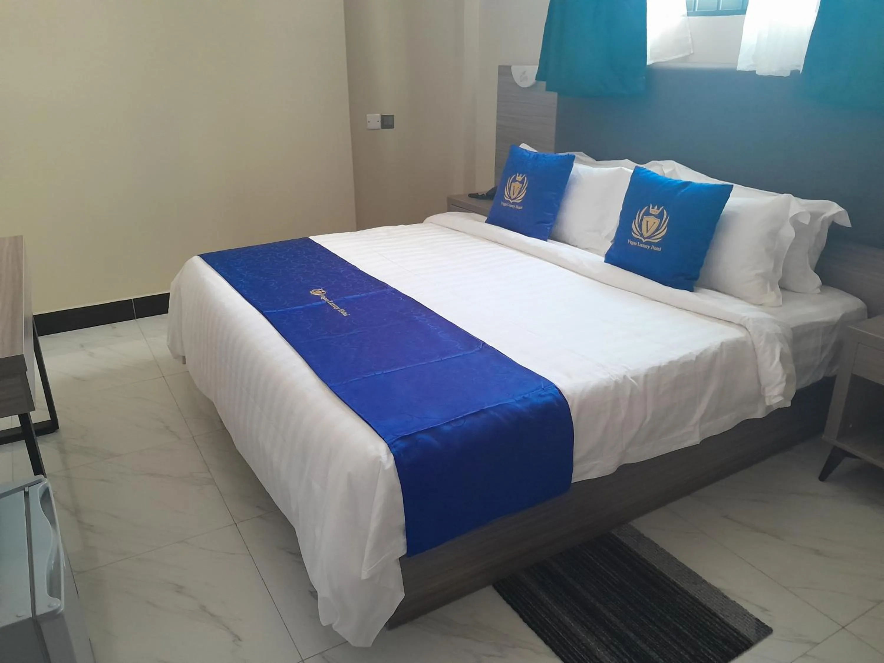 Bed in VEGAS LUXURY HOTEL