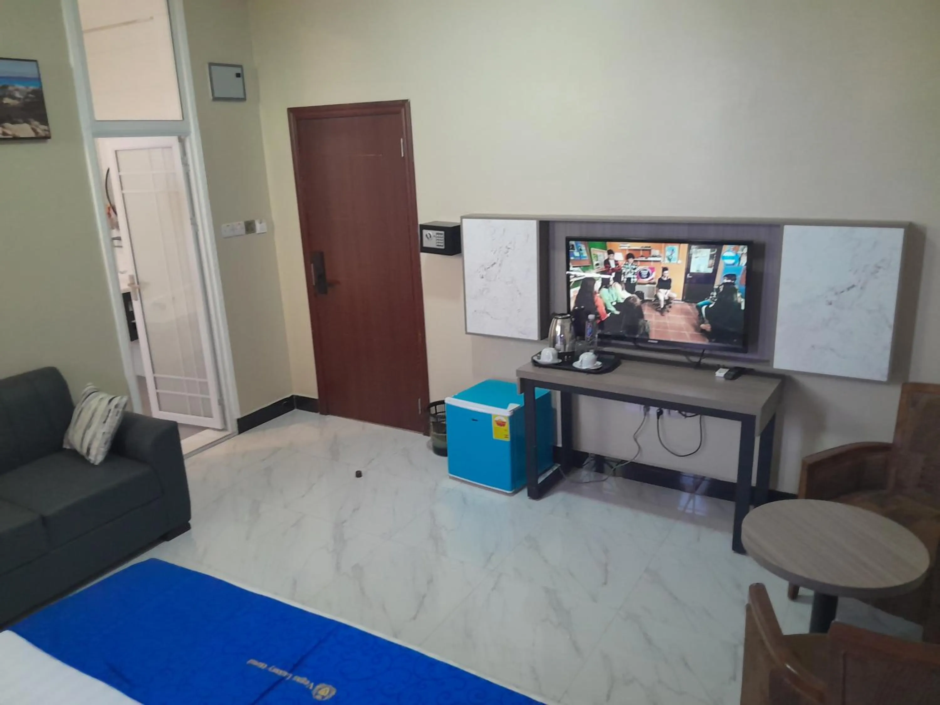 Communal lounge/ TV room in VEGAS LUXURY HOTEL