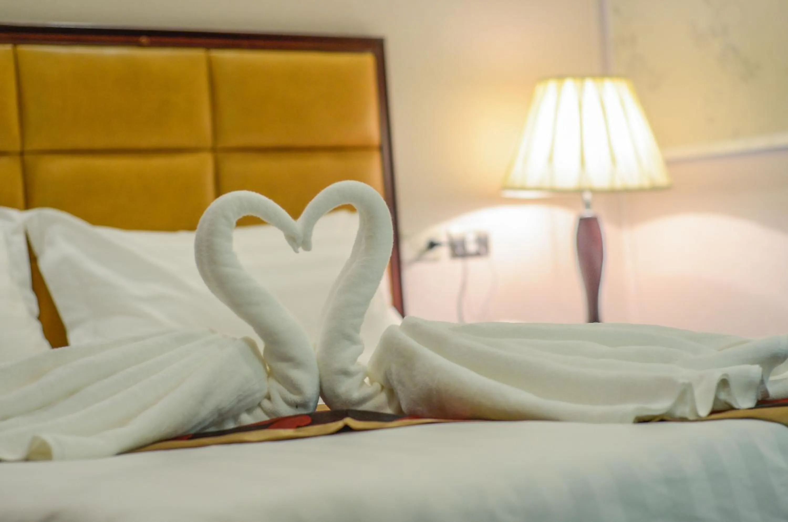 Bed in Palawan Uno Hotel