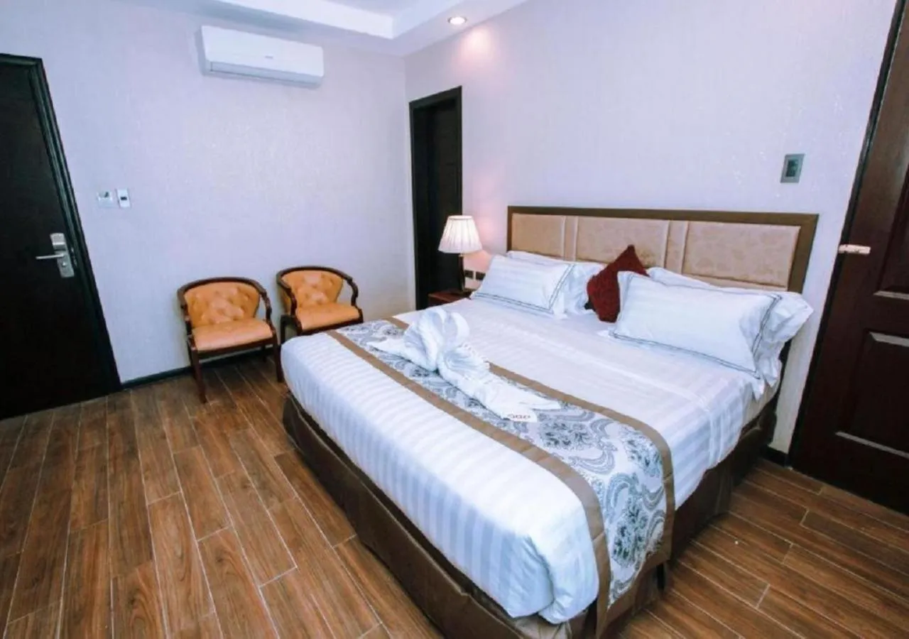 Bed in Palawan Uno Hotel