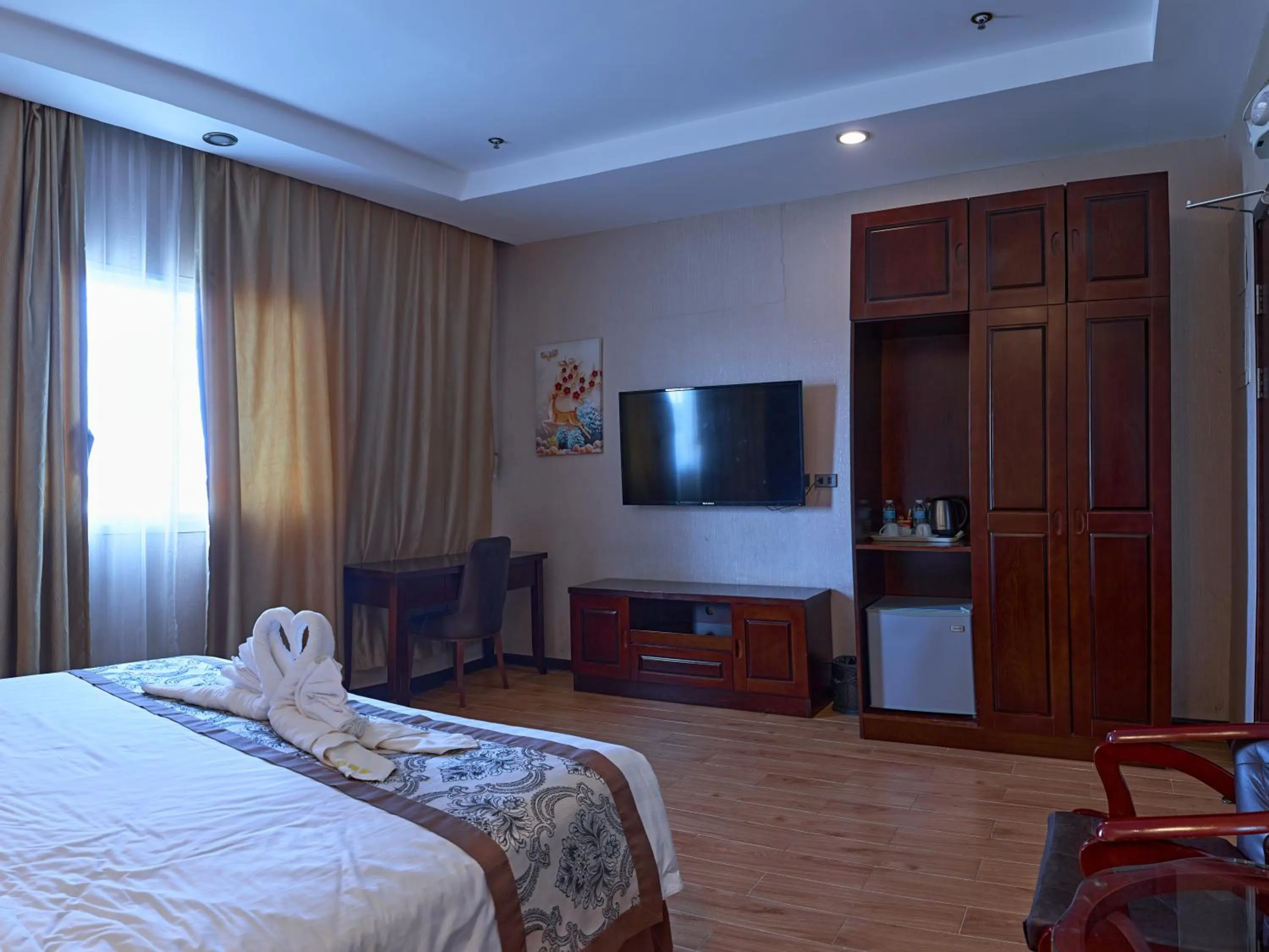 Bed in Palawan Uno Hotel